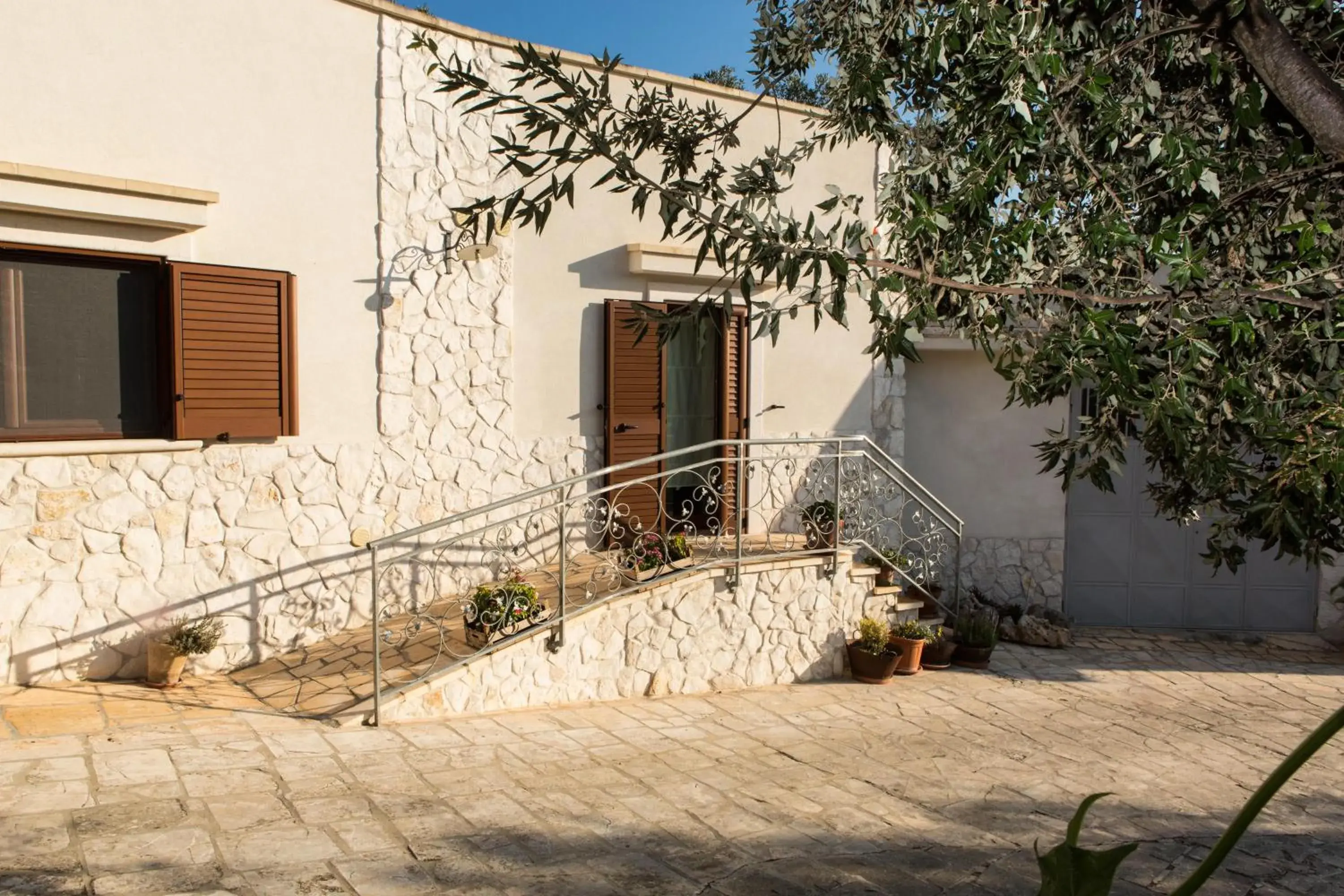 Quadruple Room with Garden View in fiori e massi Quadruple Room with Garden View in fiori e massi