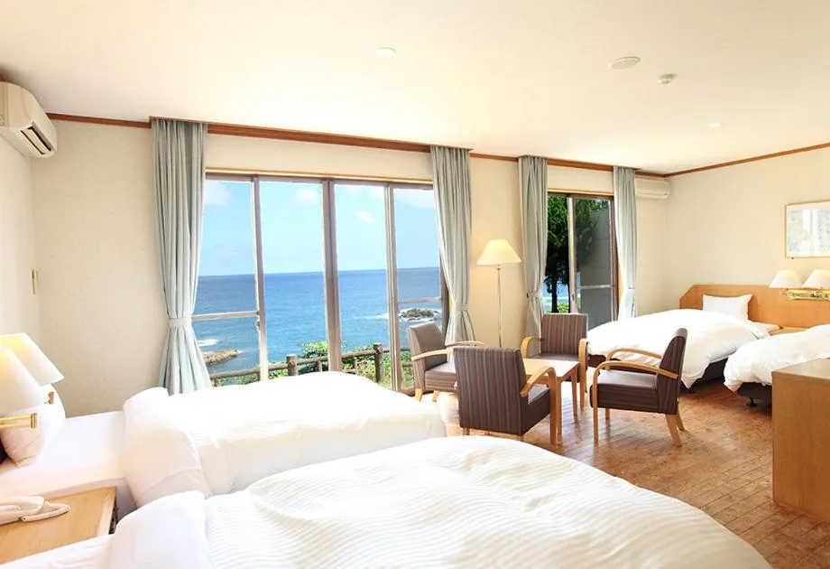 Bed in Tsushima Grand Hotel