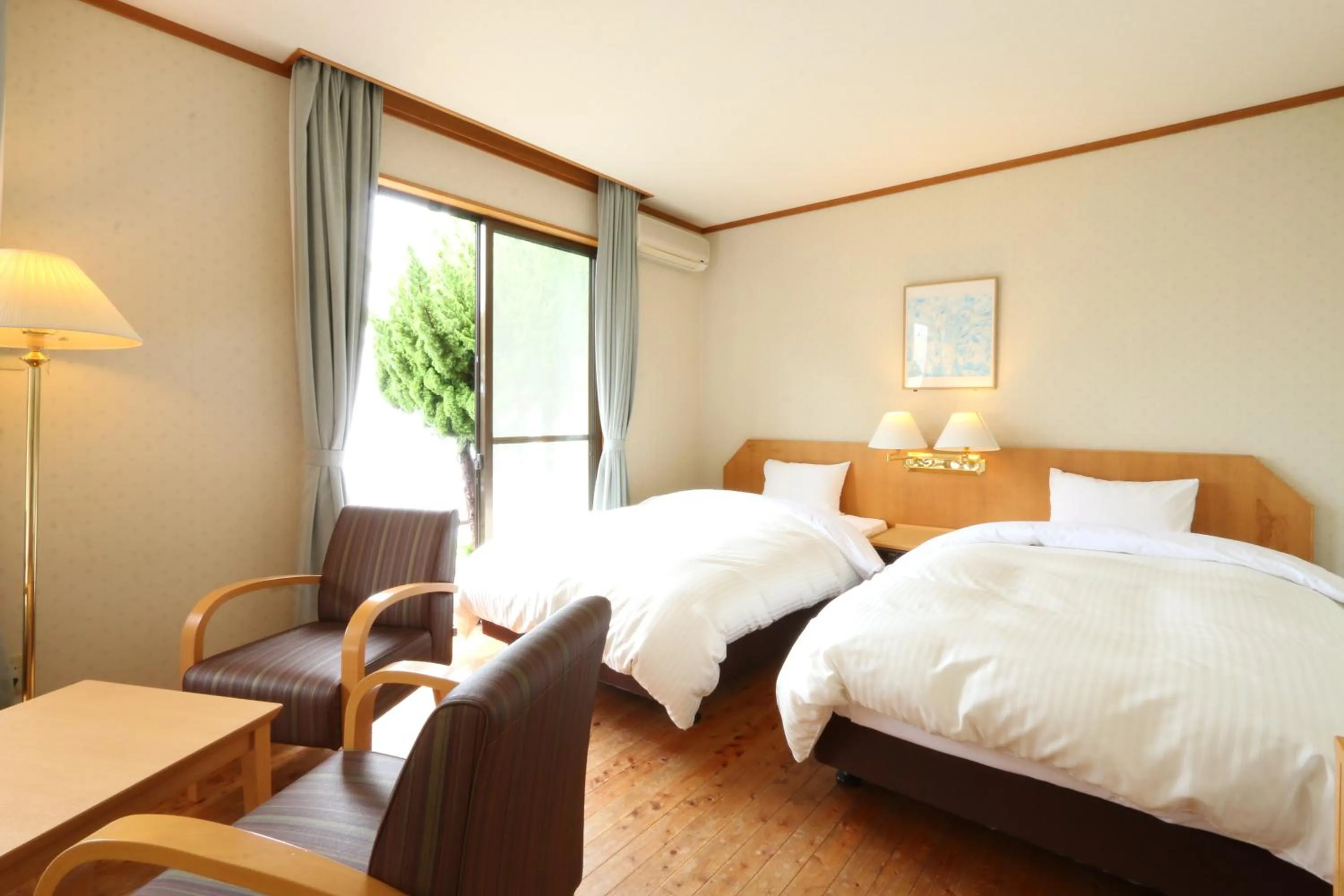 Bedroom, Bed in Tsushima Grand Hotel