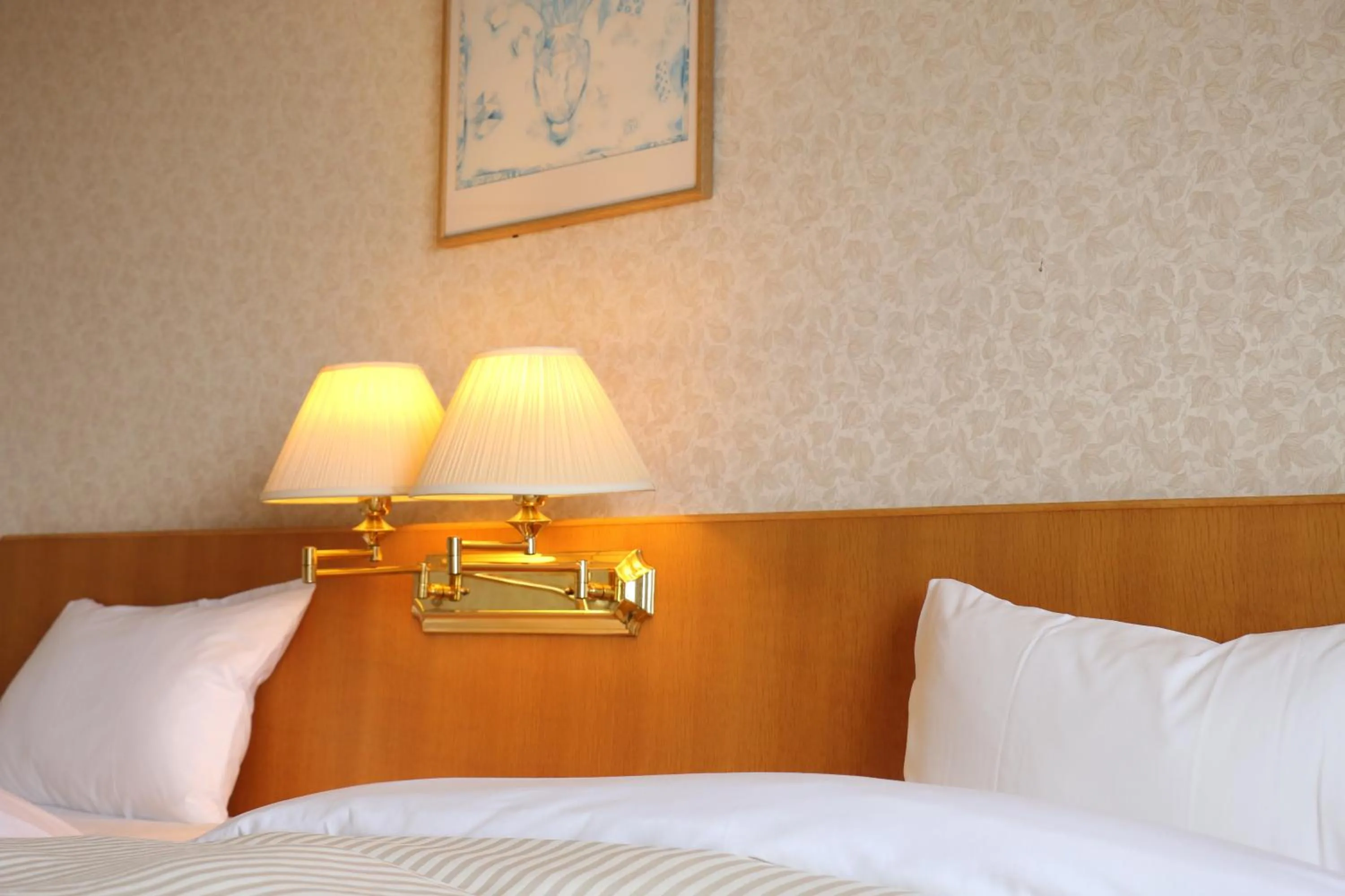 Bed in Tsushima Grand Hotel