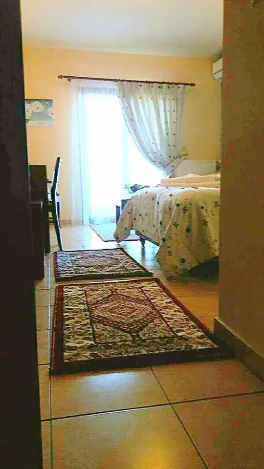 Quadruple Room in Asteras Hotel Quadruple Room in Asteras Hotel