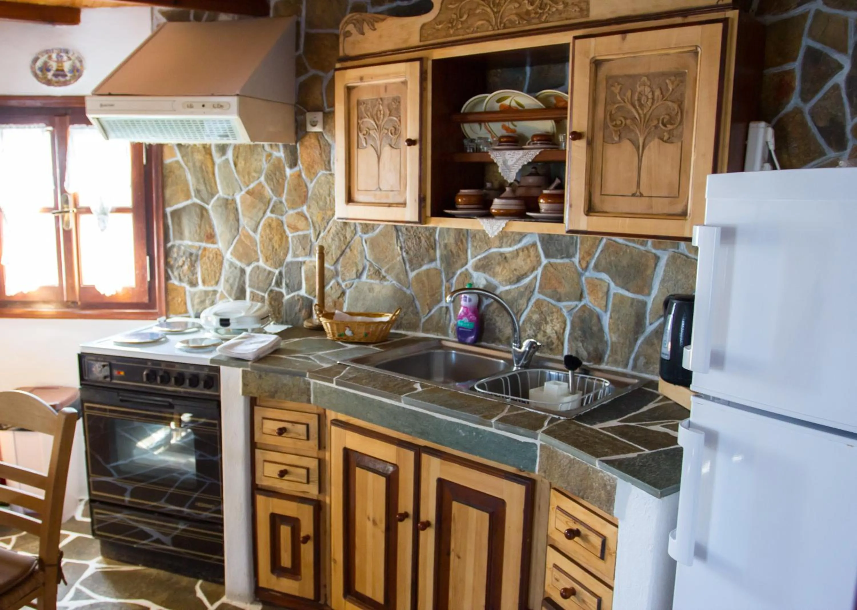 Kitchen or kitchenette in Villa Mantalena