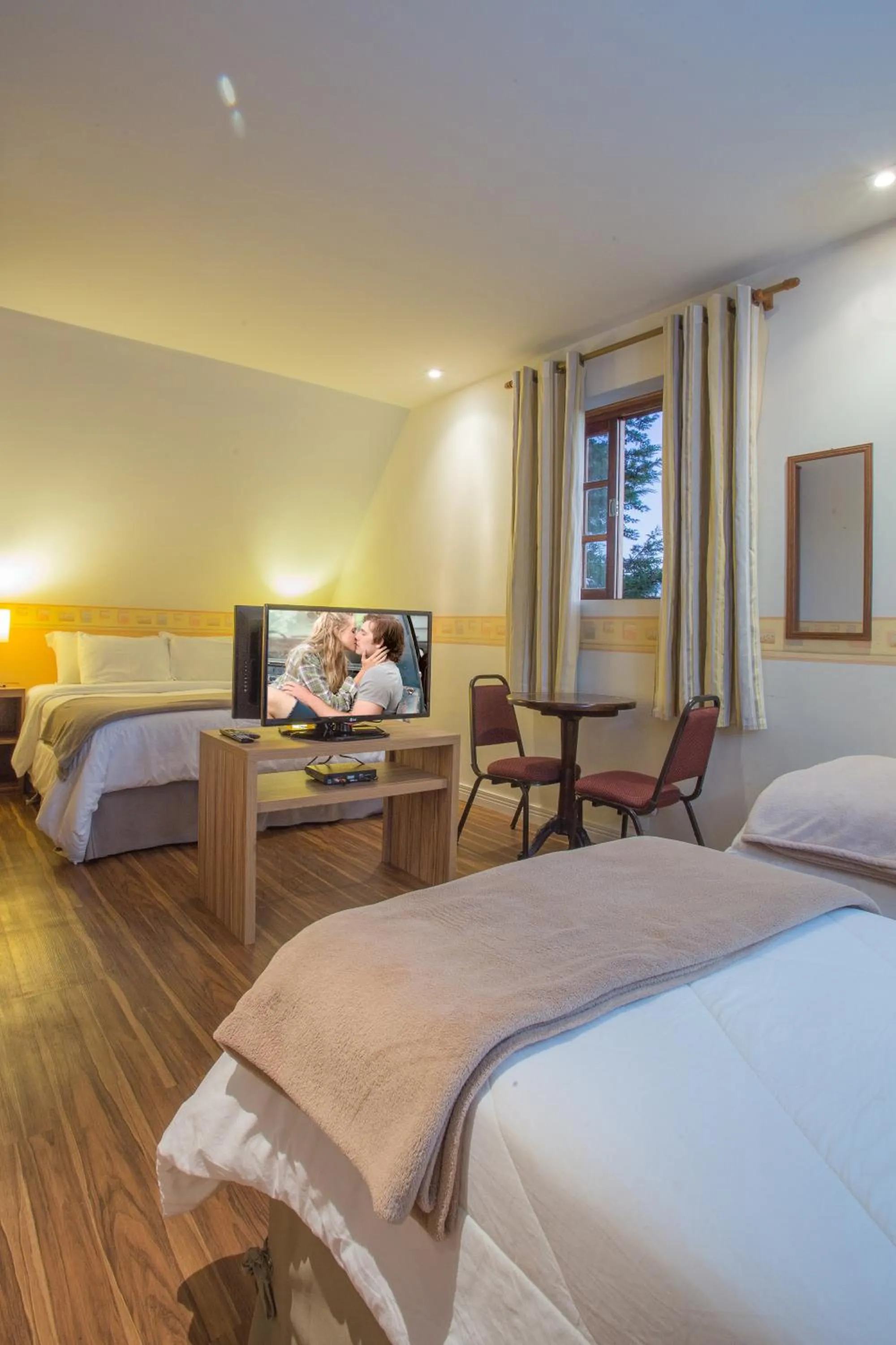 Bed in Pousada La Toscana Campos do Jordão