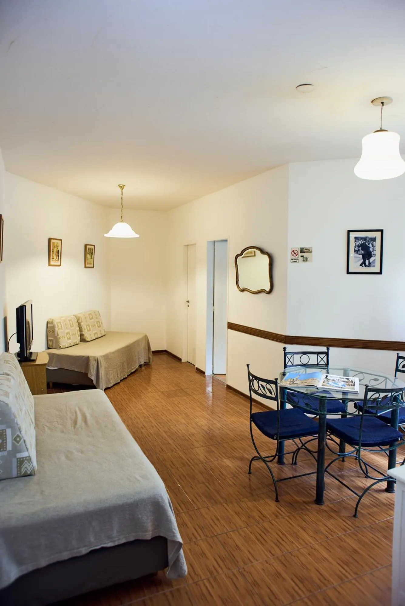 Living room, Bed in Miliño Apart Hotel