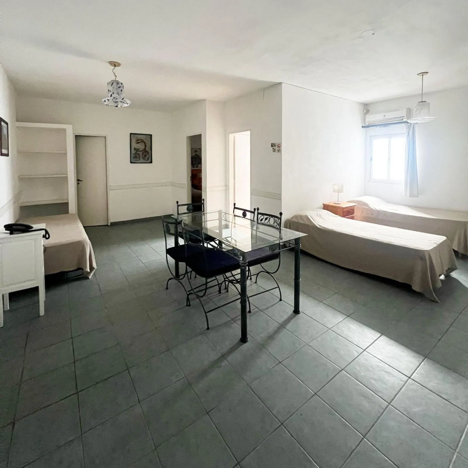 Living room, Bed in Miliño Apart Hotel