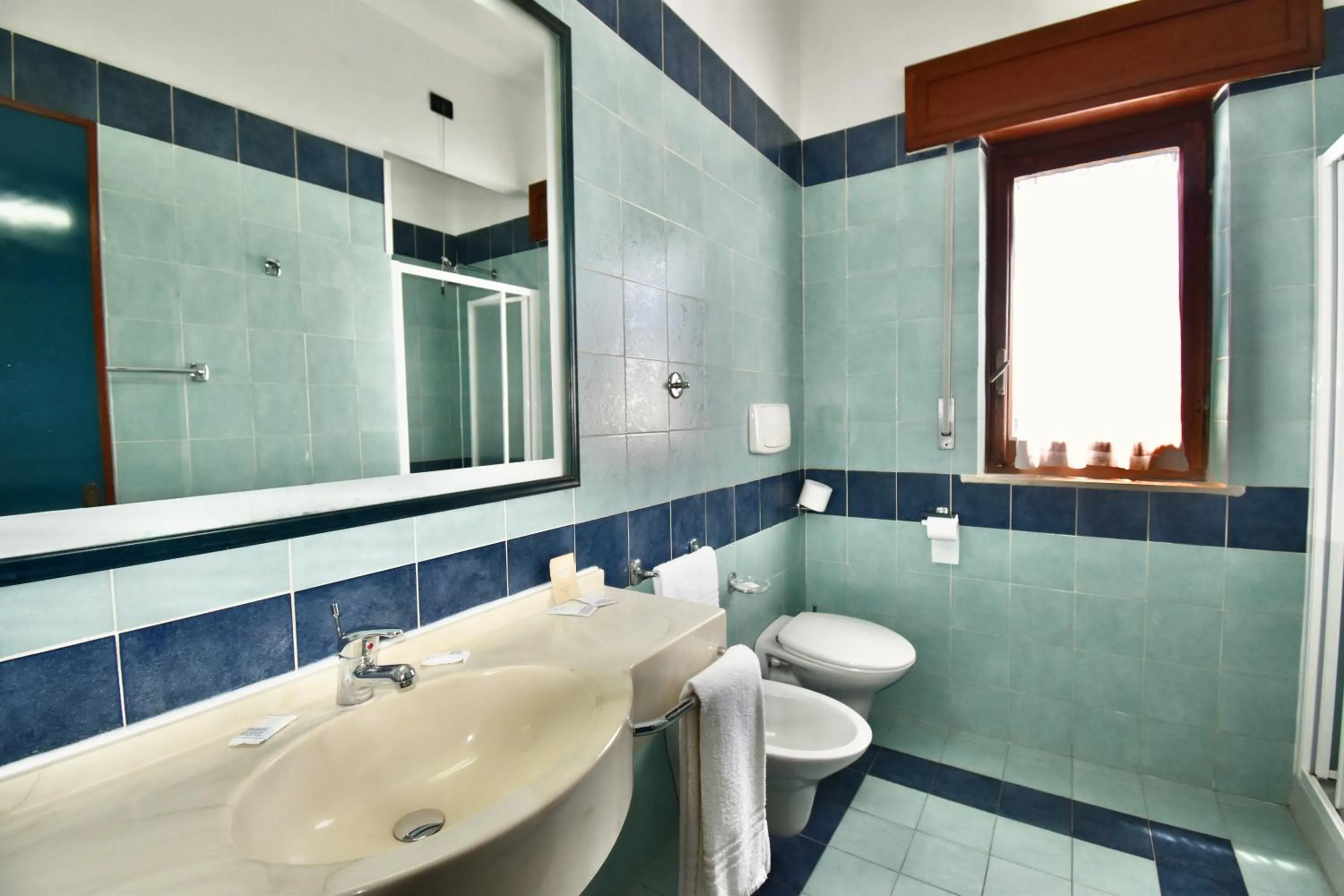 Bathroom in Cossyra Hotel