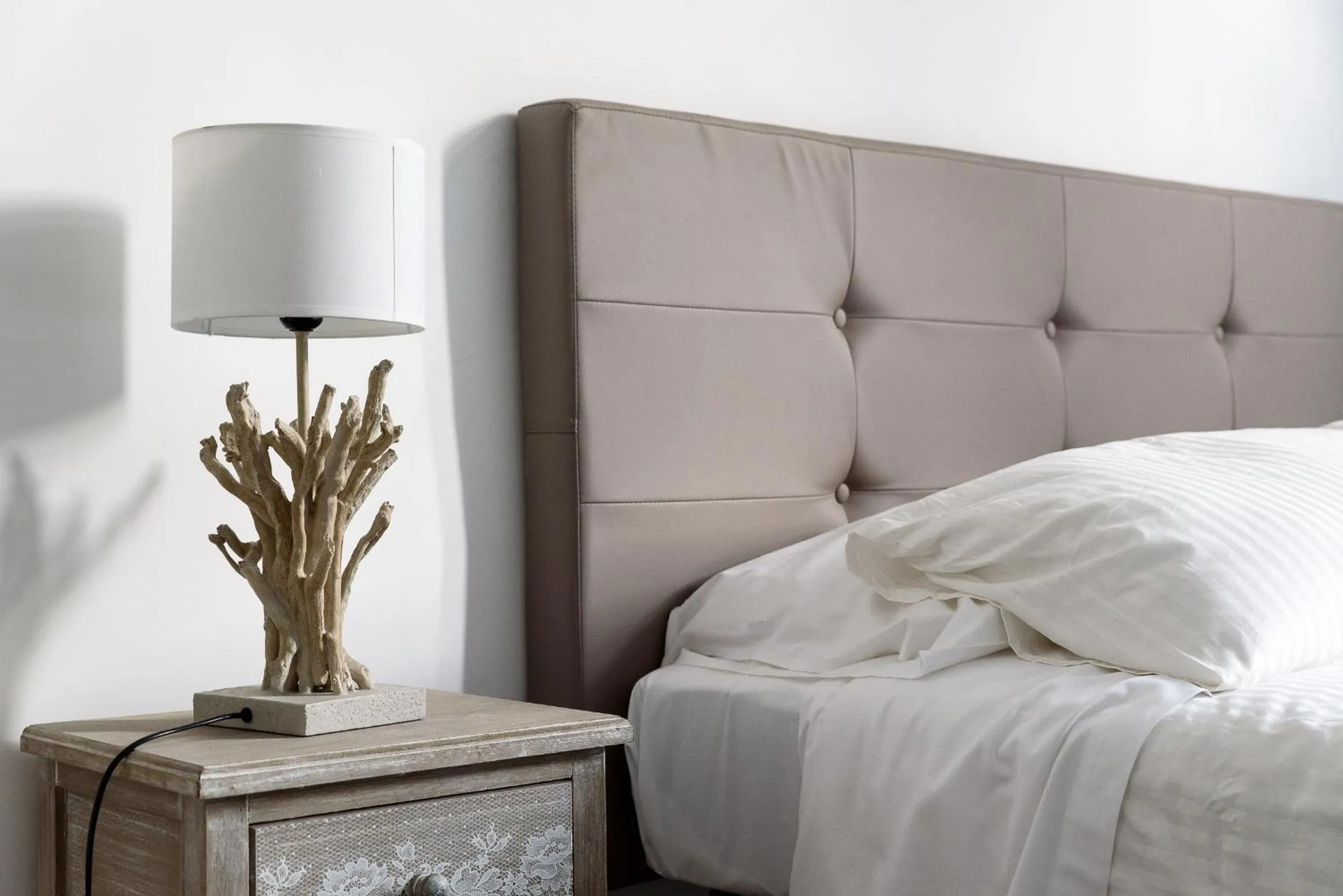 Bed in White terrace apartment navona