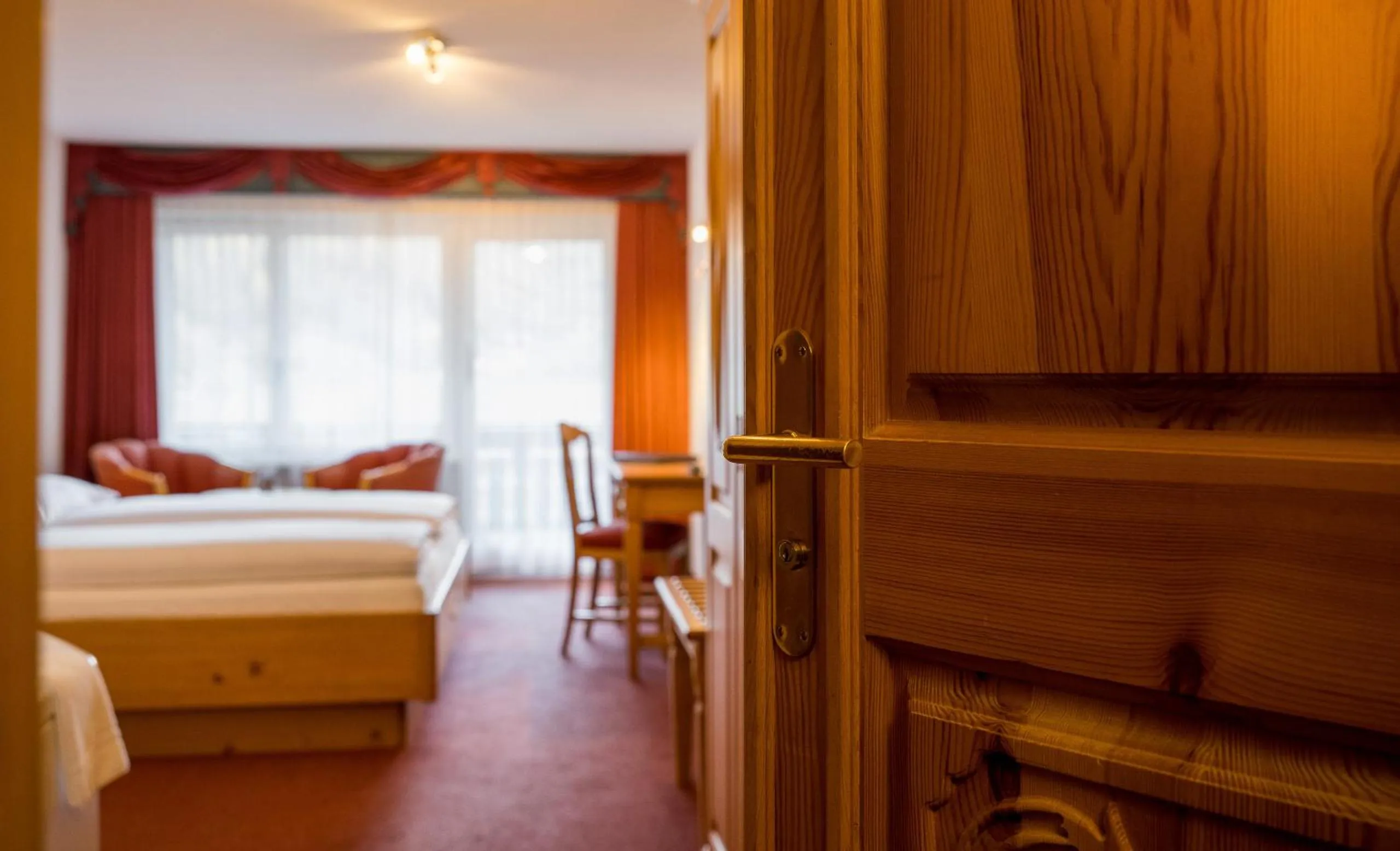 Photo of the whole room, Bed in Walliserhof