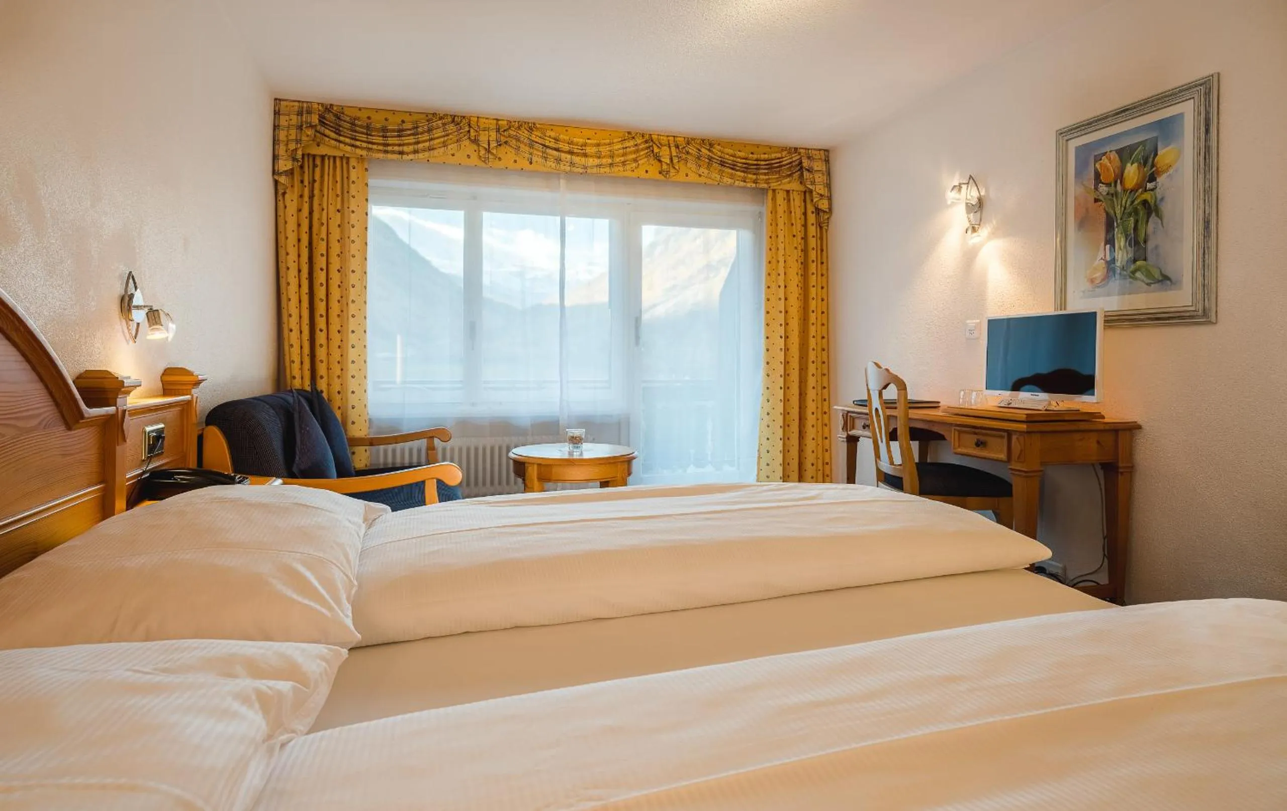 Photo of the whole room, Bed in Walliserhof