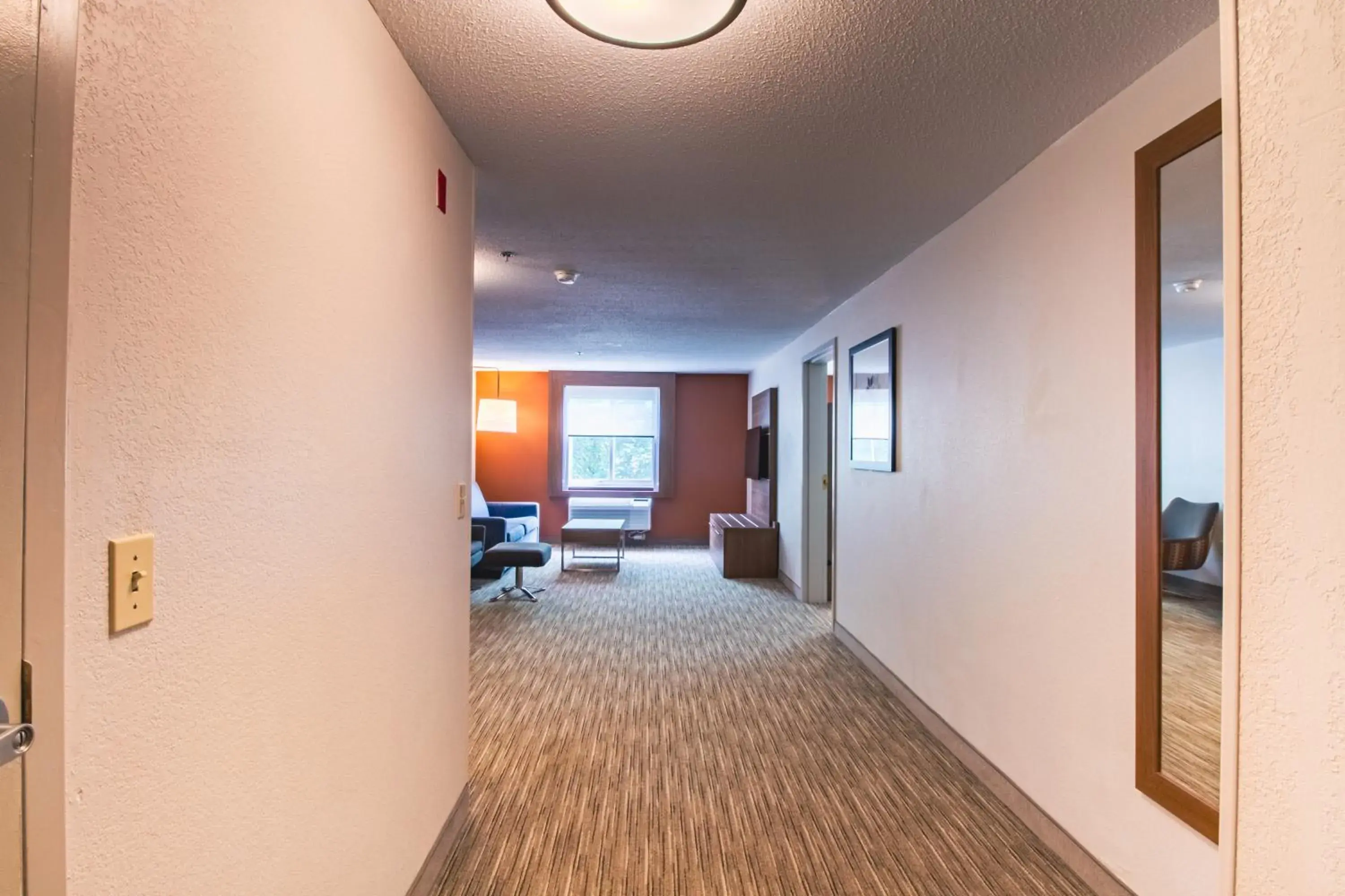 Living room in Holiday Inn Express & Suites - Lincoln East - White Mountains by IHG Living room in Holiday Inn Express & Suites - Lincoln East - White Mountains by IHG