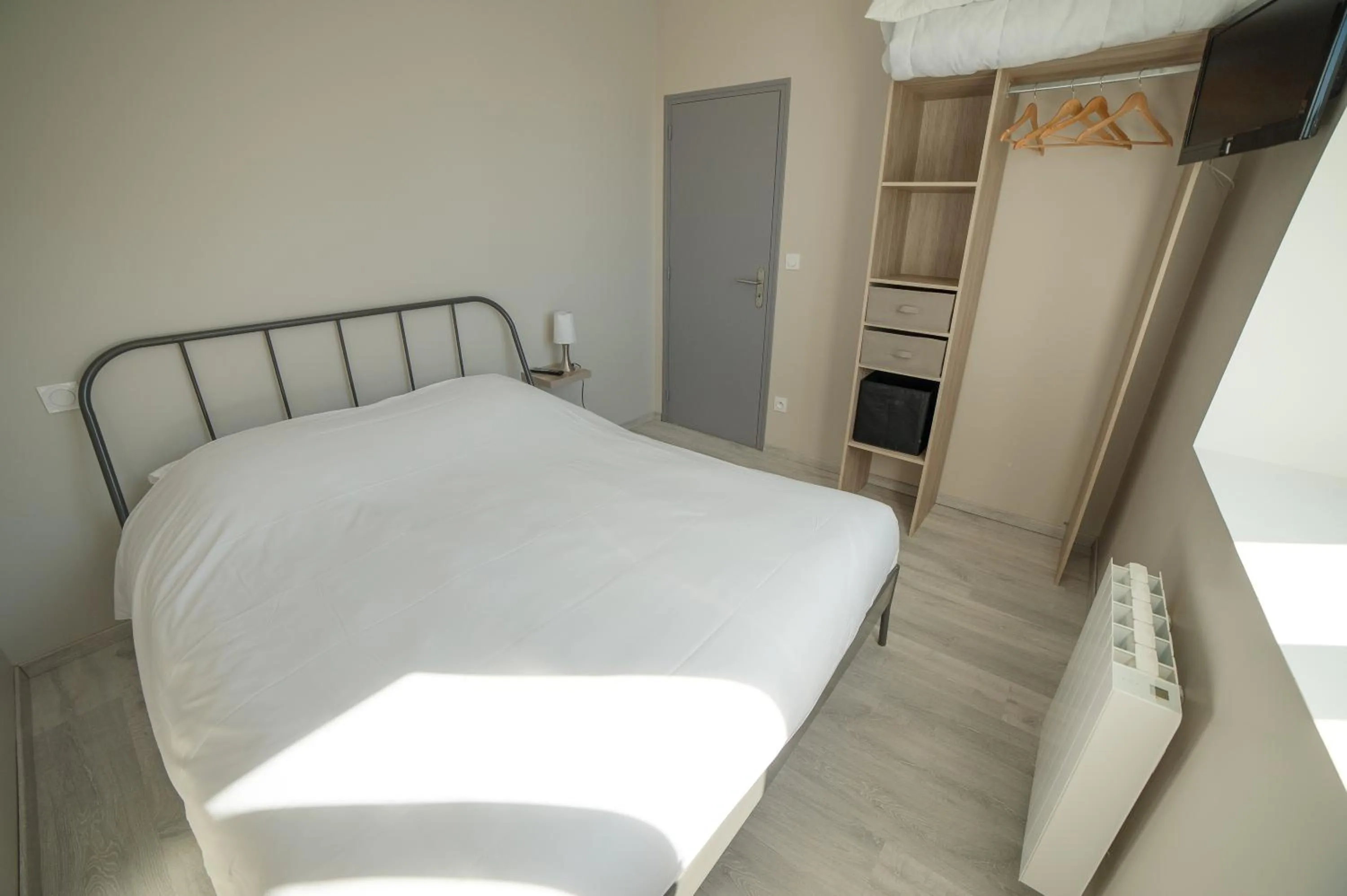 Bed in Appart Hotel de la Souleuvre