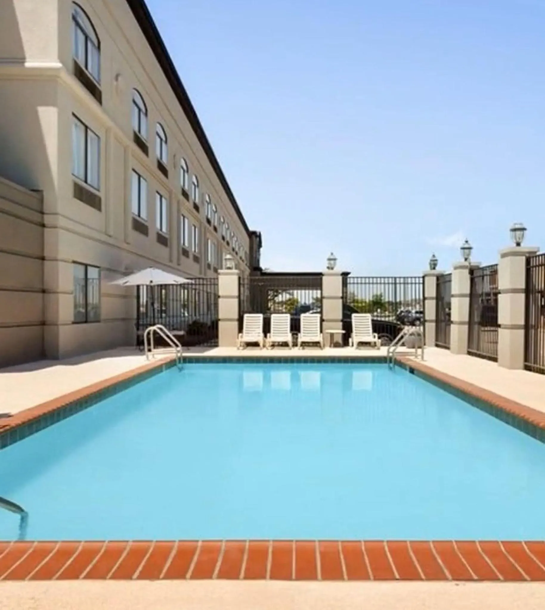 Swimming pool in Townhome Inn & Suites by IHG