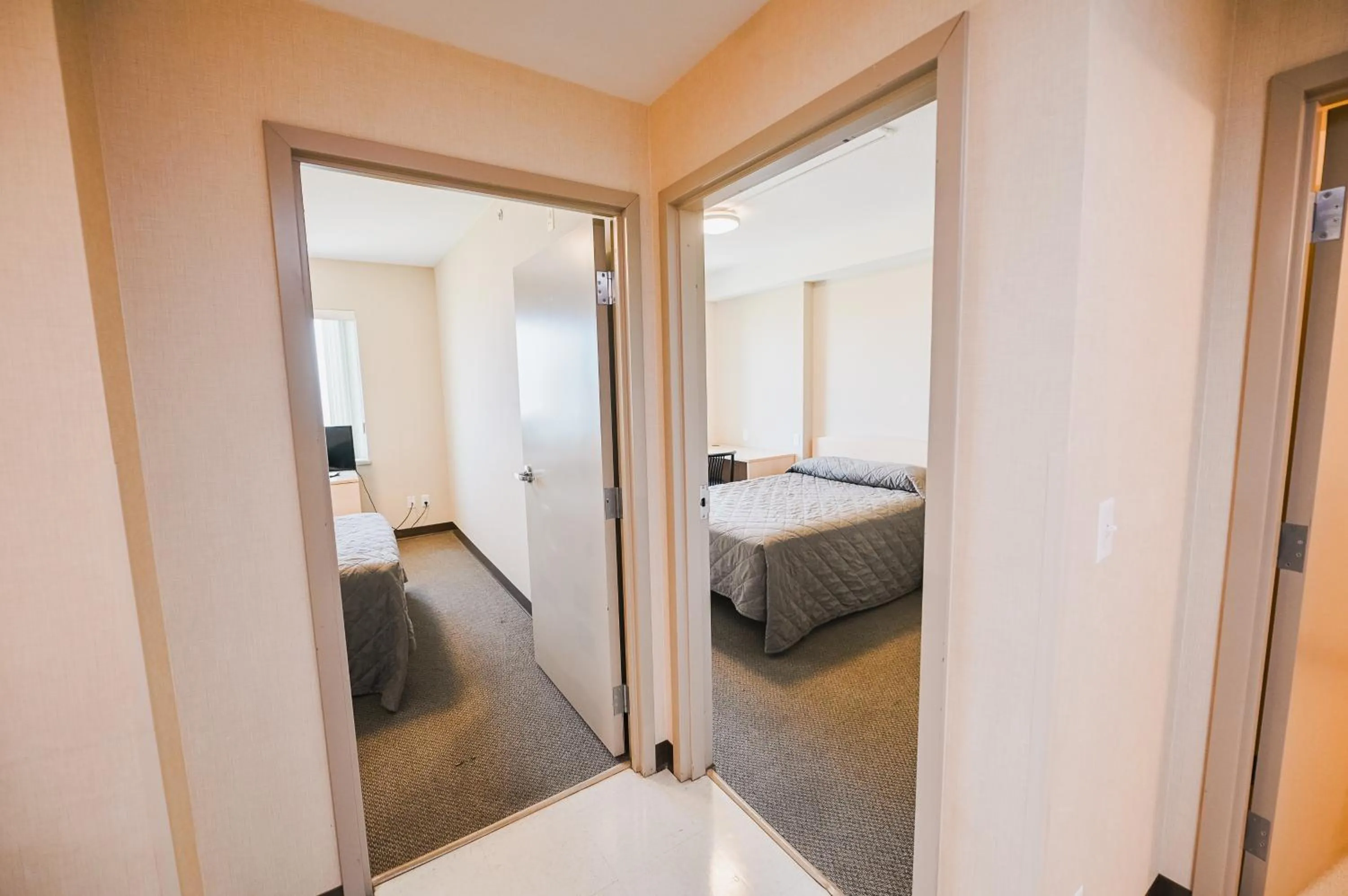 Bedroom, Bed in Residence & Conference Centre - Kamloops