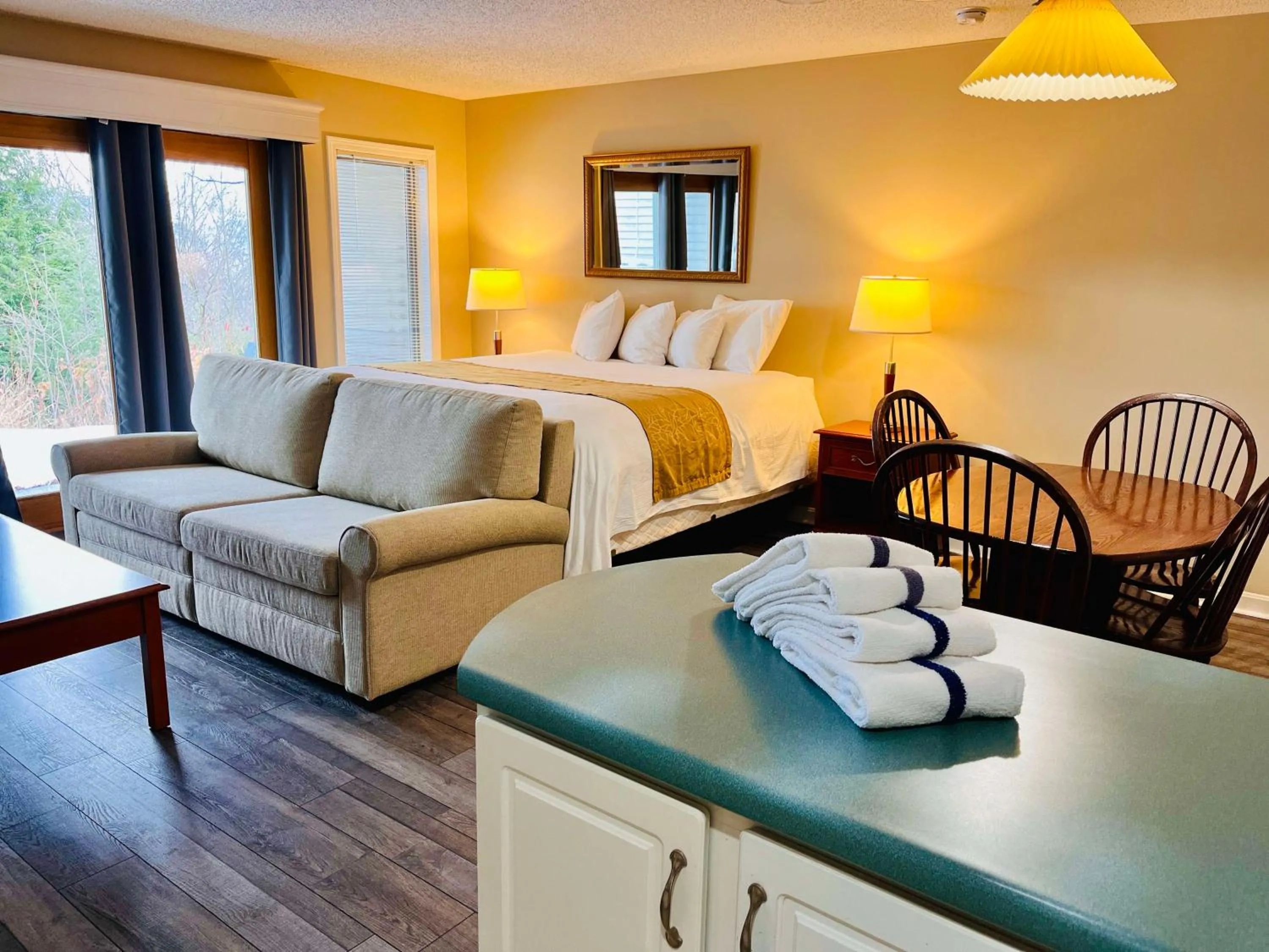 Living room, Bed in Nordic Village Condominium Resort