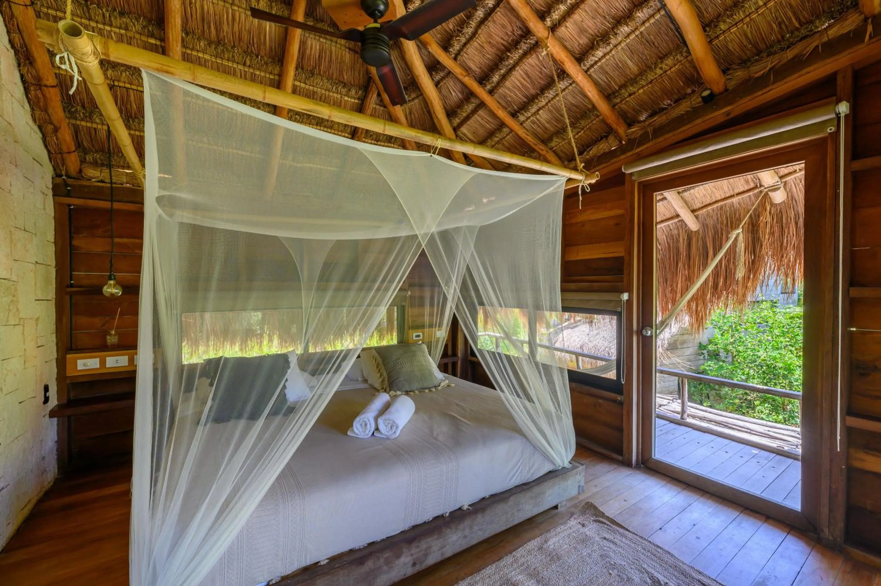 Bed in Vida Silvestre Tulum