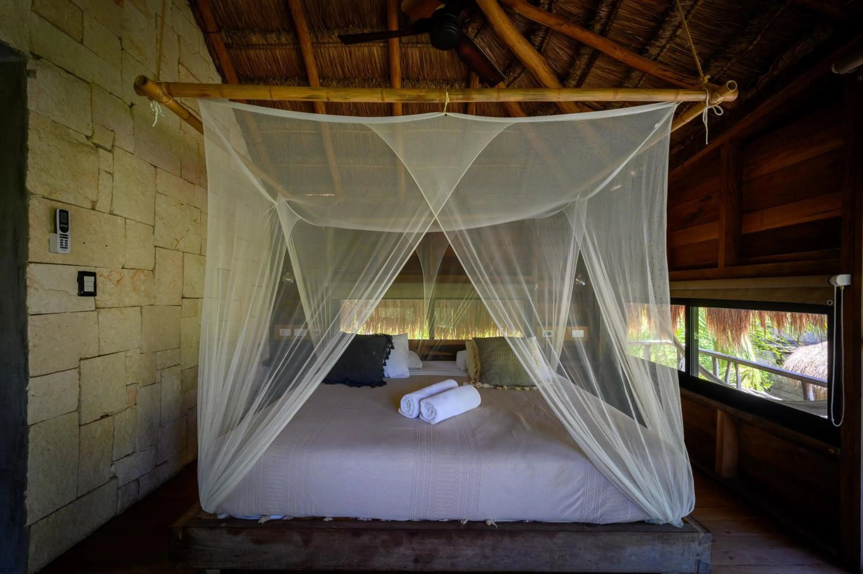Bed in Vida Silvestre Tulum