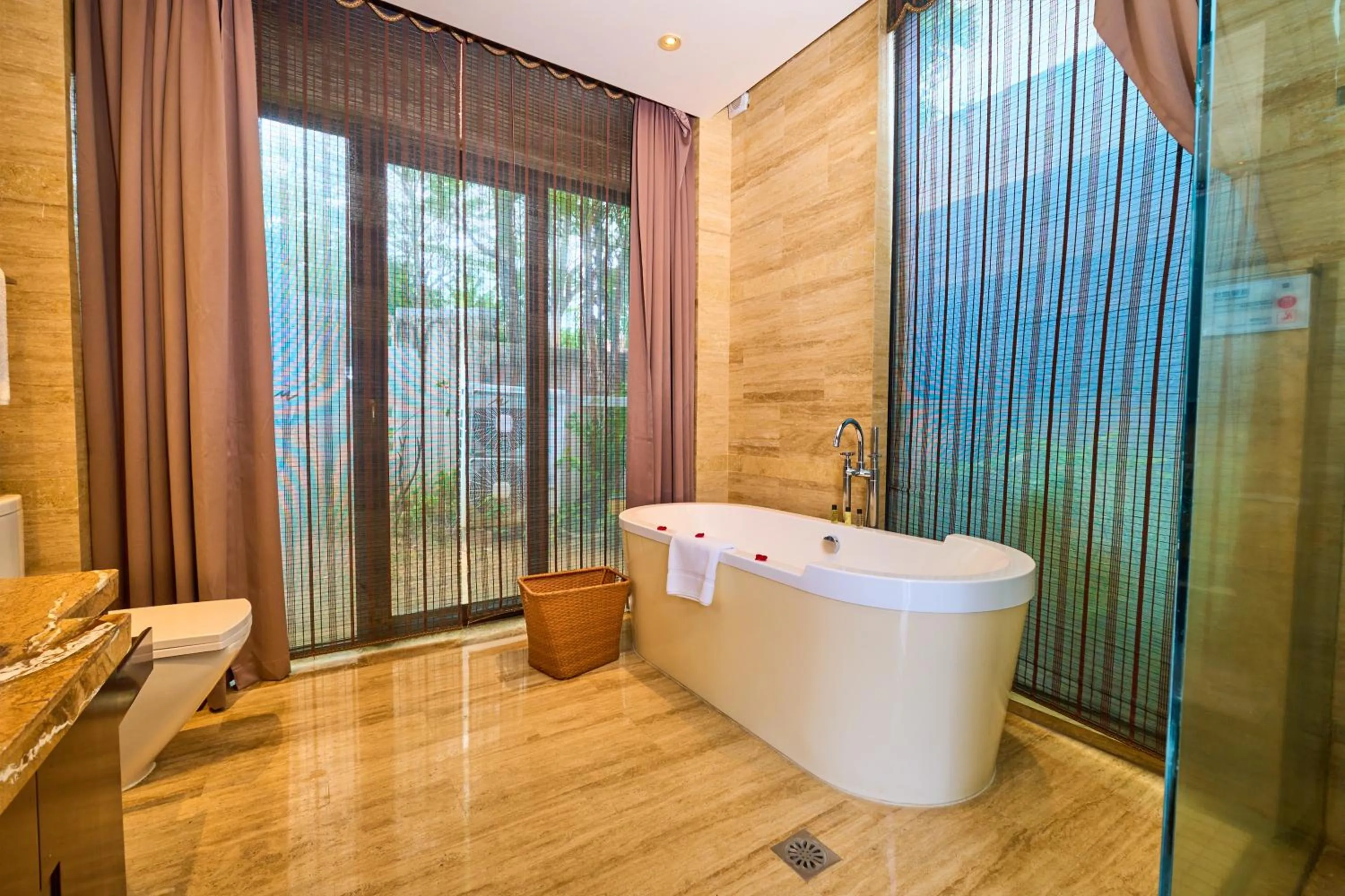 Shower in Grand Metropark Villa Resort Sanya Yalong Bay