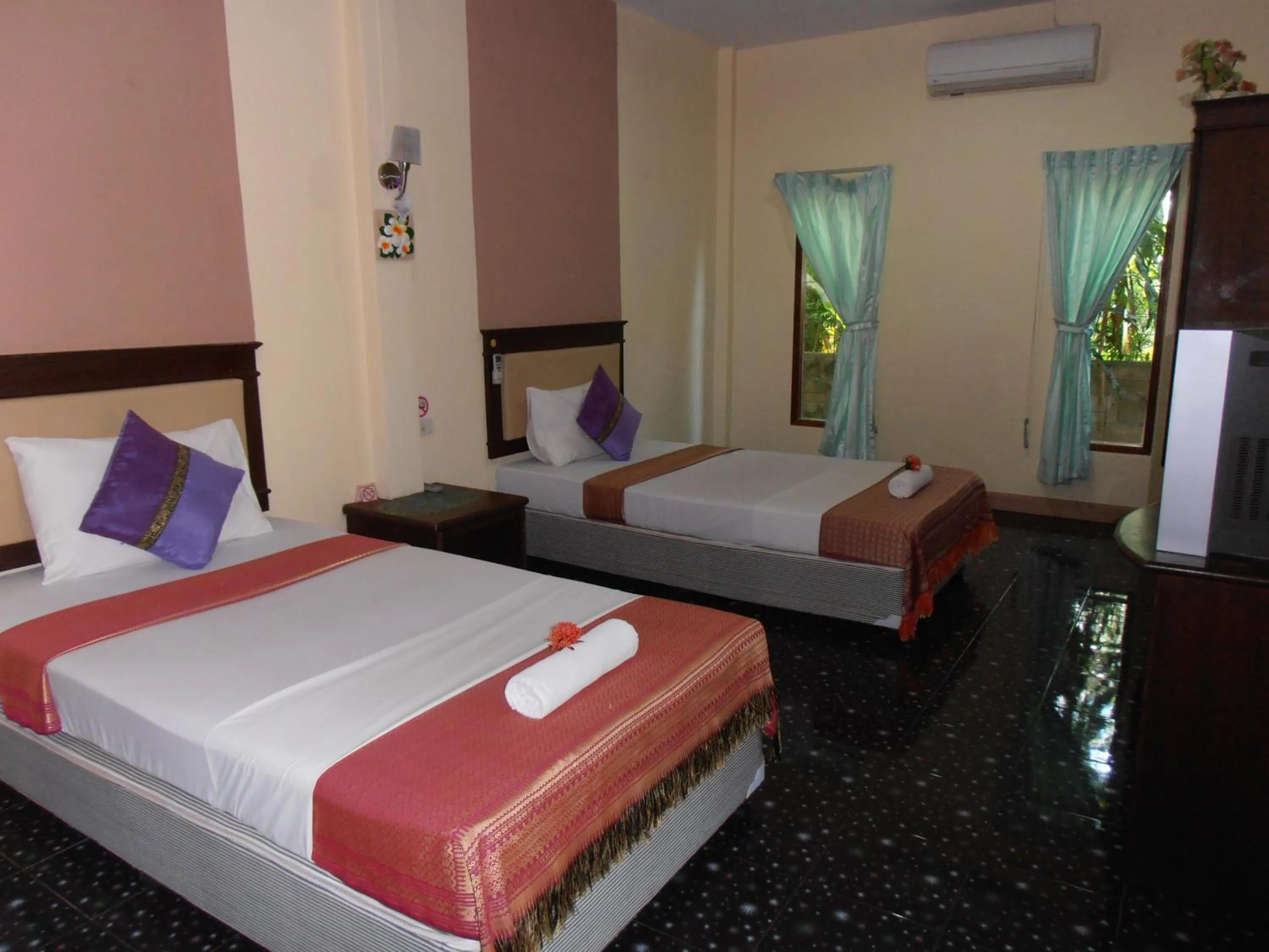 Bed in Aonang Green Park Bungalow