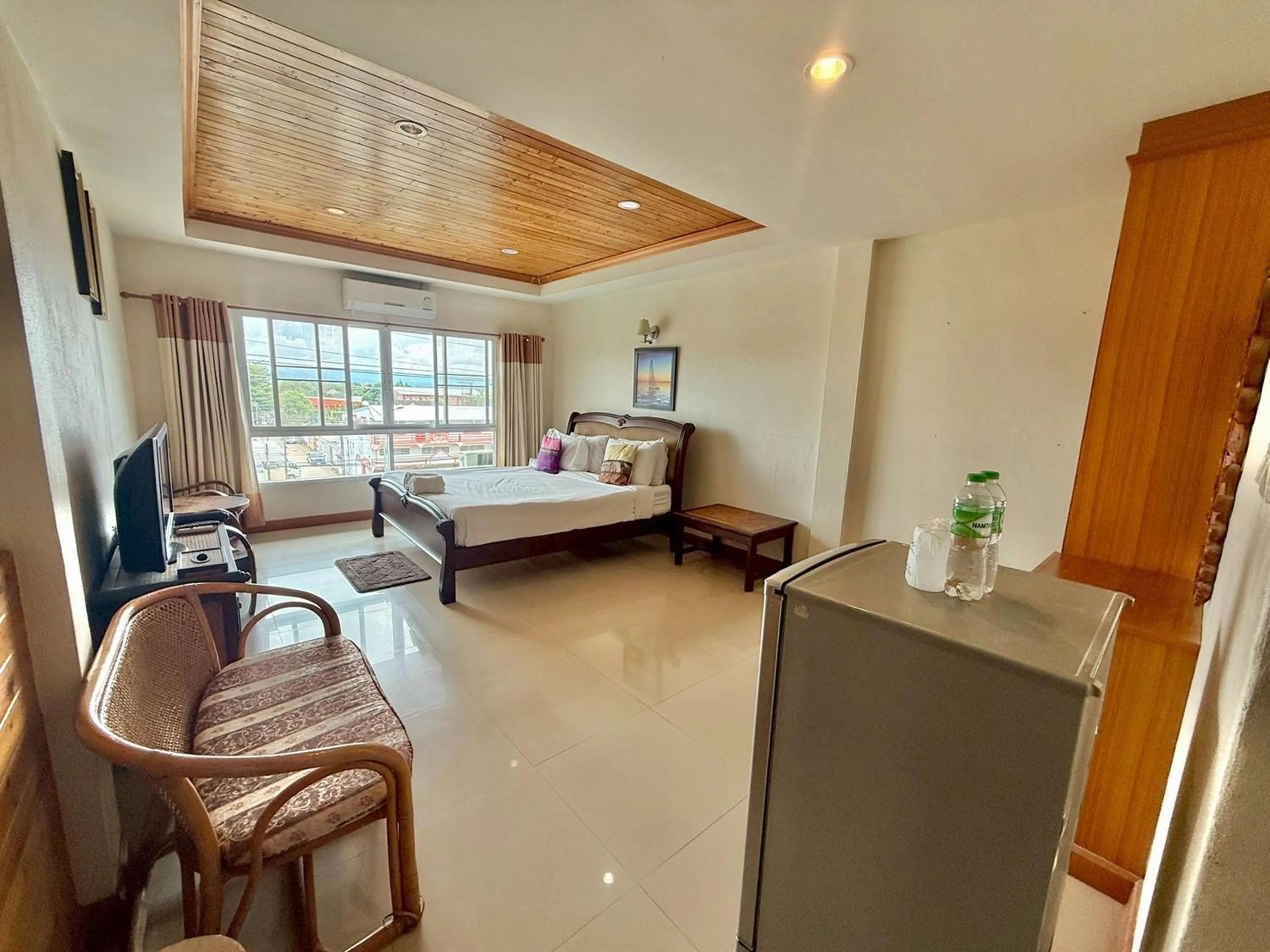 Photo of the whole room, Bed in Maekhong Delta Boutique Hotel