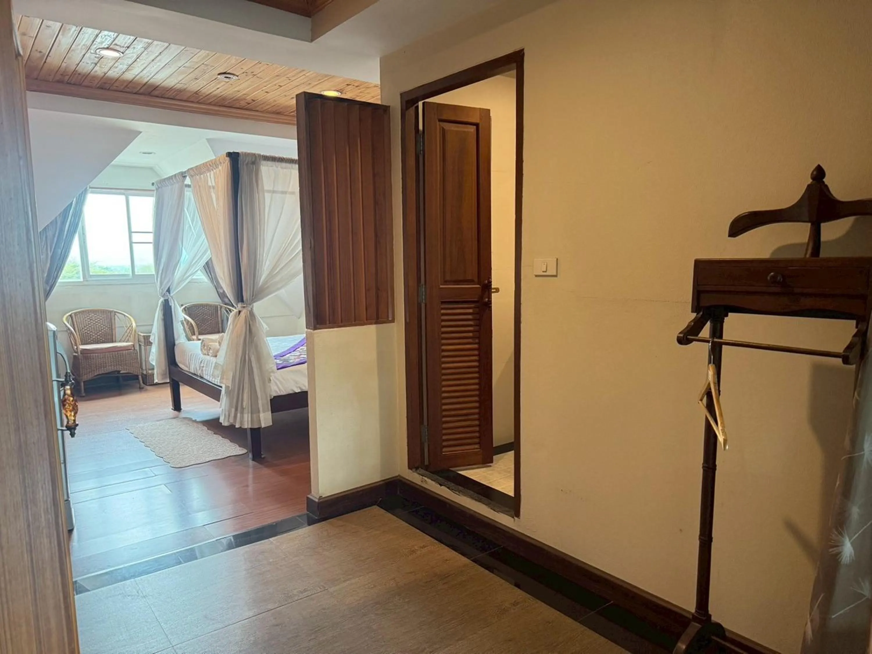 Photo of the whole room, Bed in Maekhong Delta Boutique Hotel