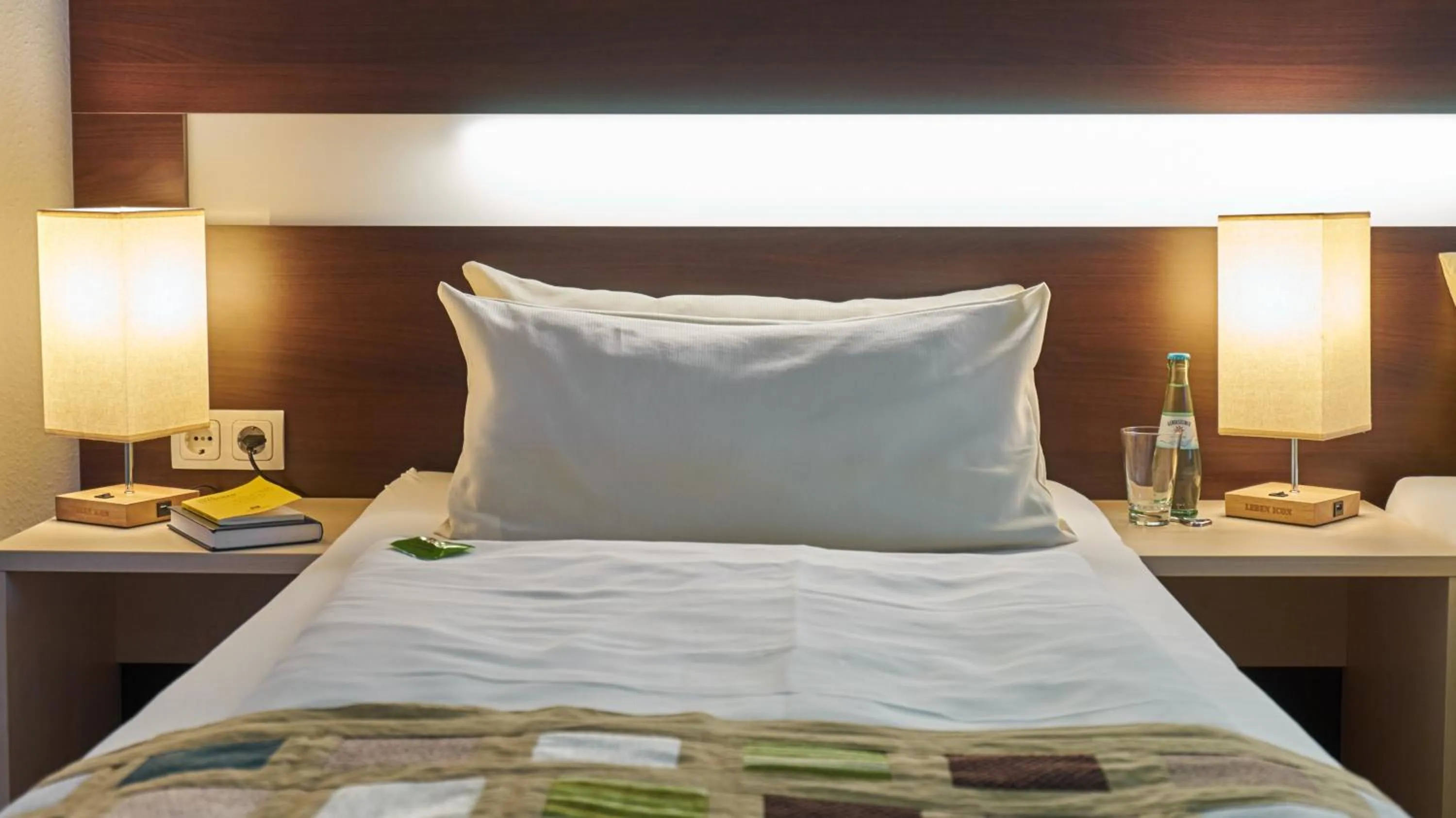 Bed in Hotel im Kornspeicher