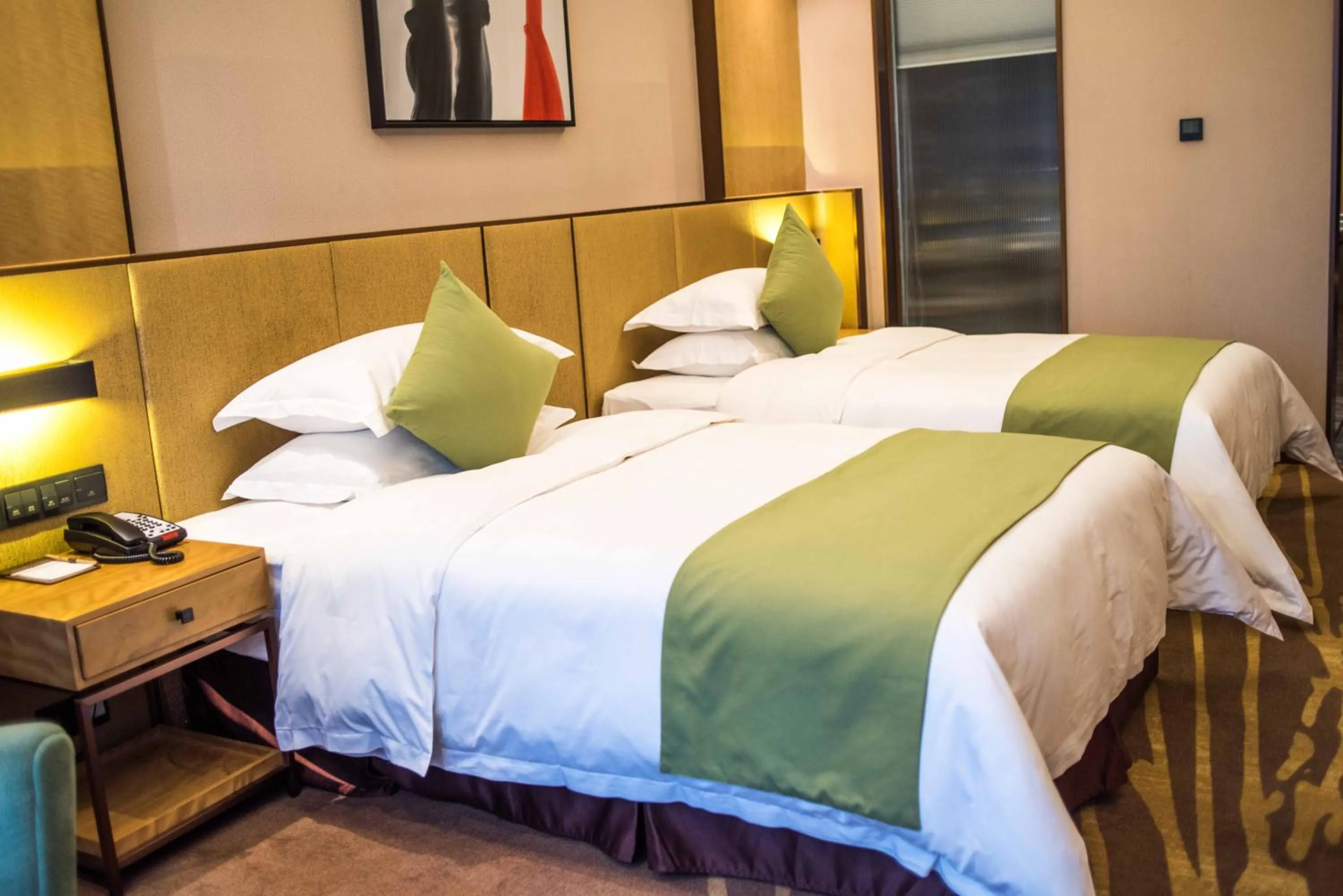 Bed in Leshan Ramada Hotel