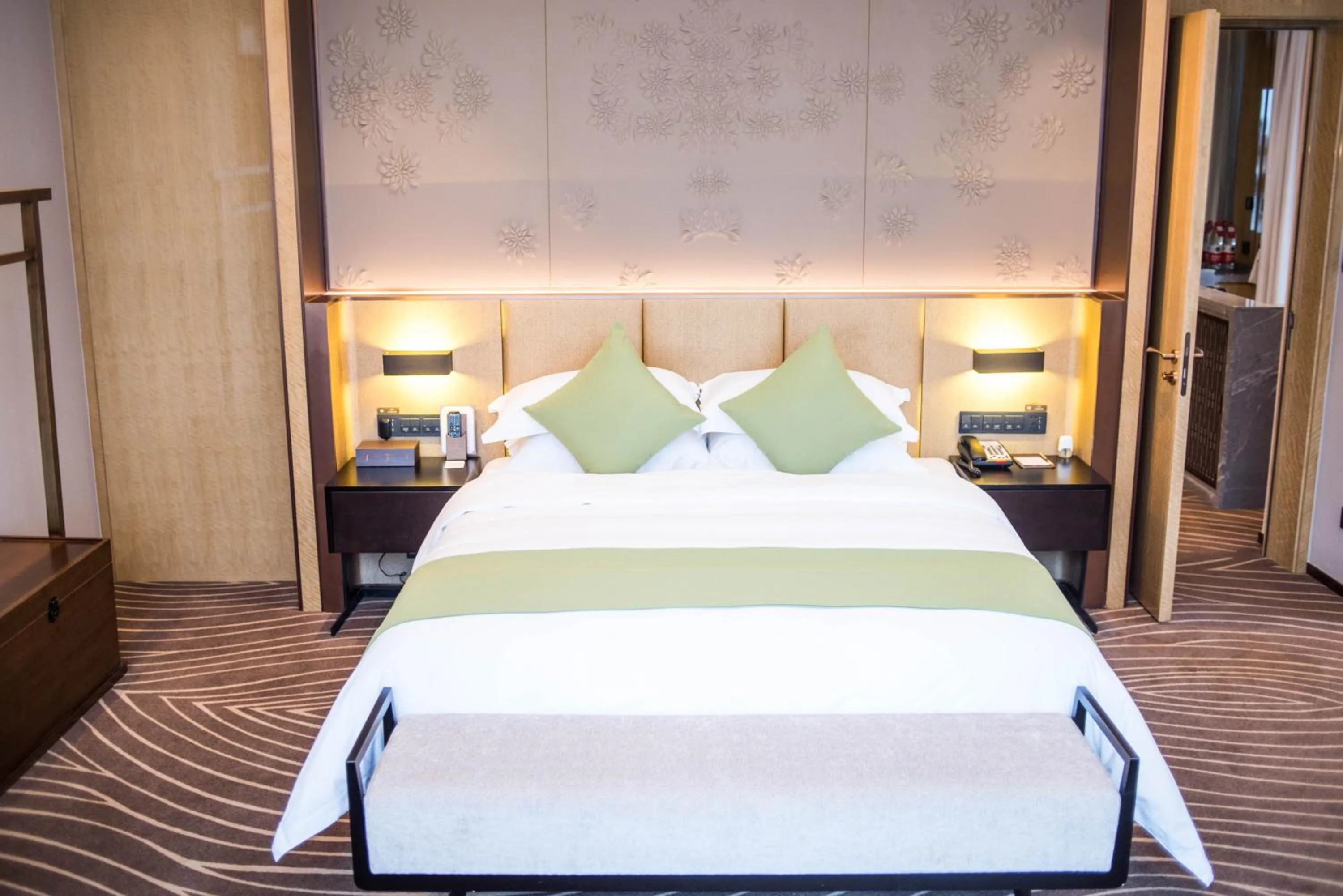 Bed in Leshan Ramada Hotel