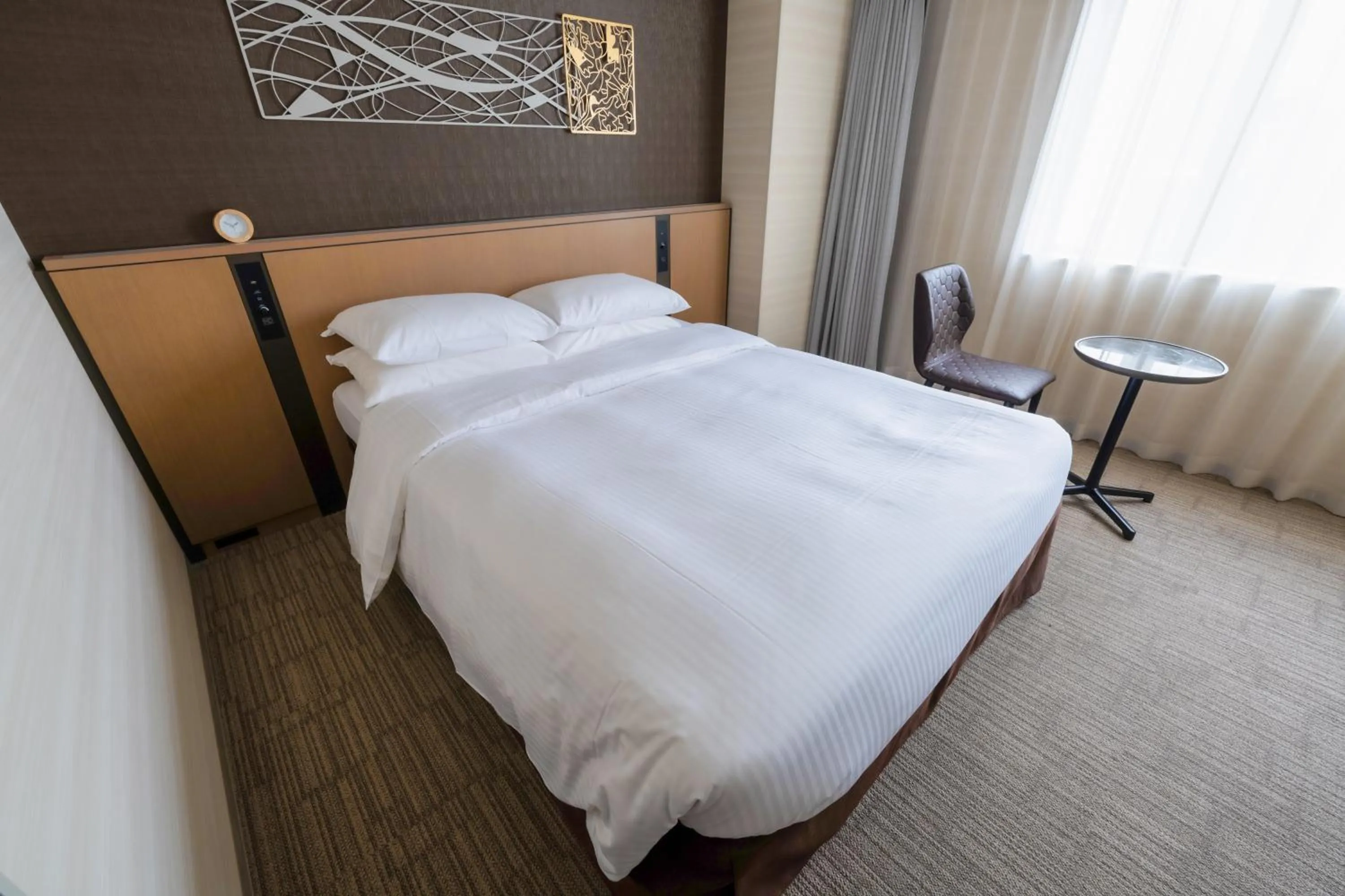 Bed in Richmond Hotel Yokohama Ekimae