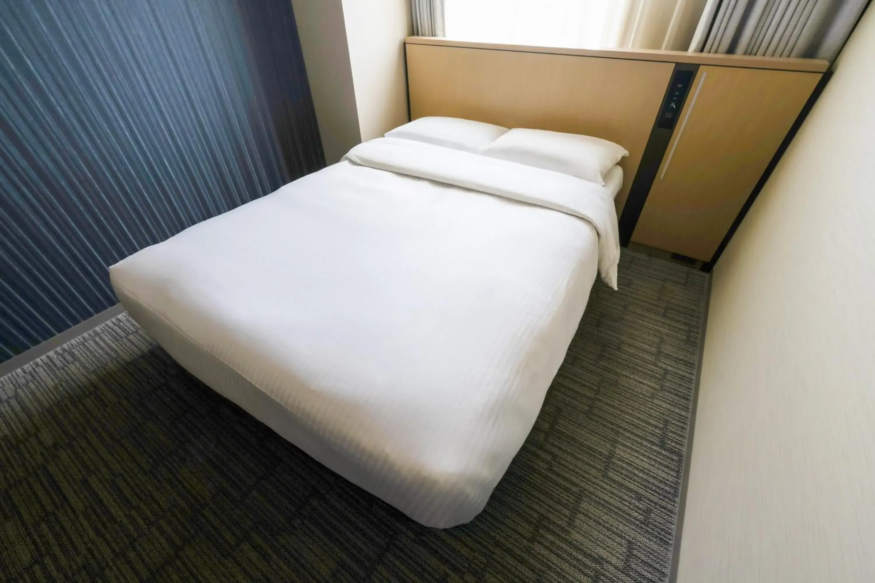 Bed in Richmond Hotel Yokohama Ekimae Bed in Richmond Hotel Yokohama Ekimae