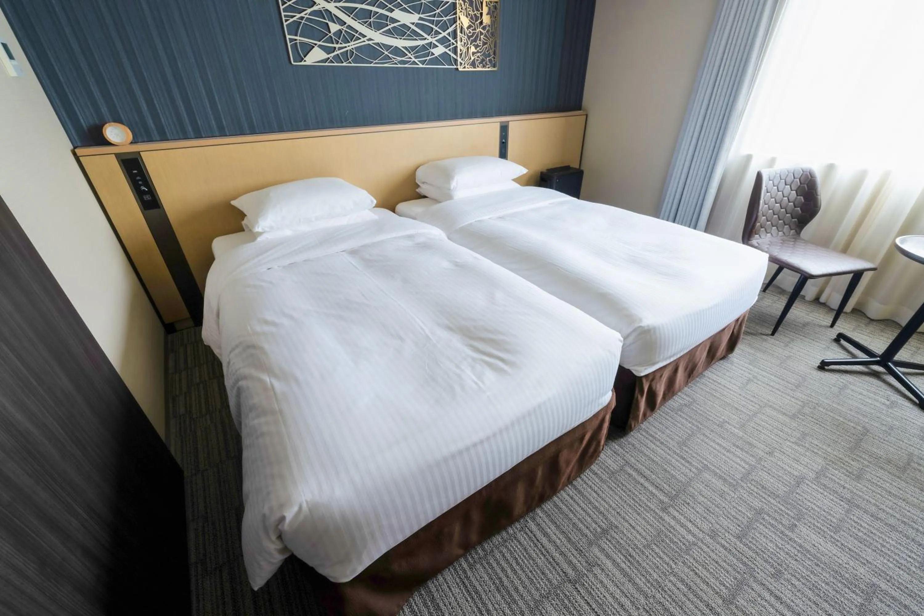 Bed in Richmond Hotel Yokohama Ekimae