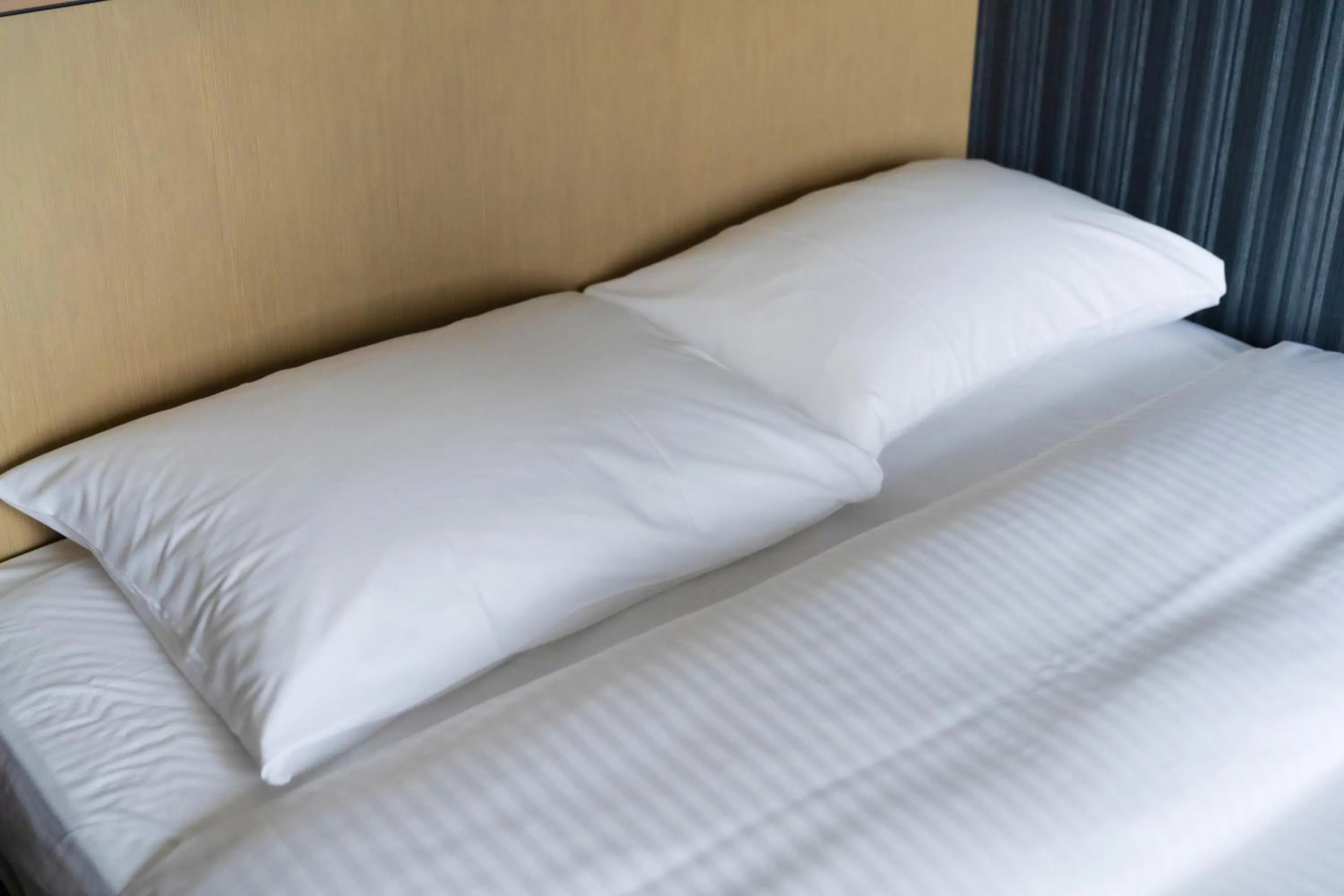 Bed in Richmond Hotel Yokohama Ekimae