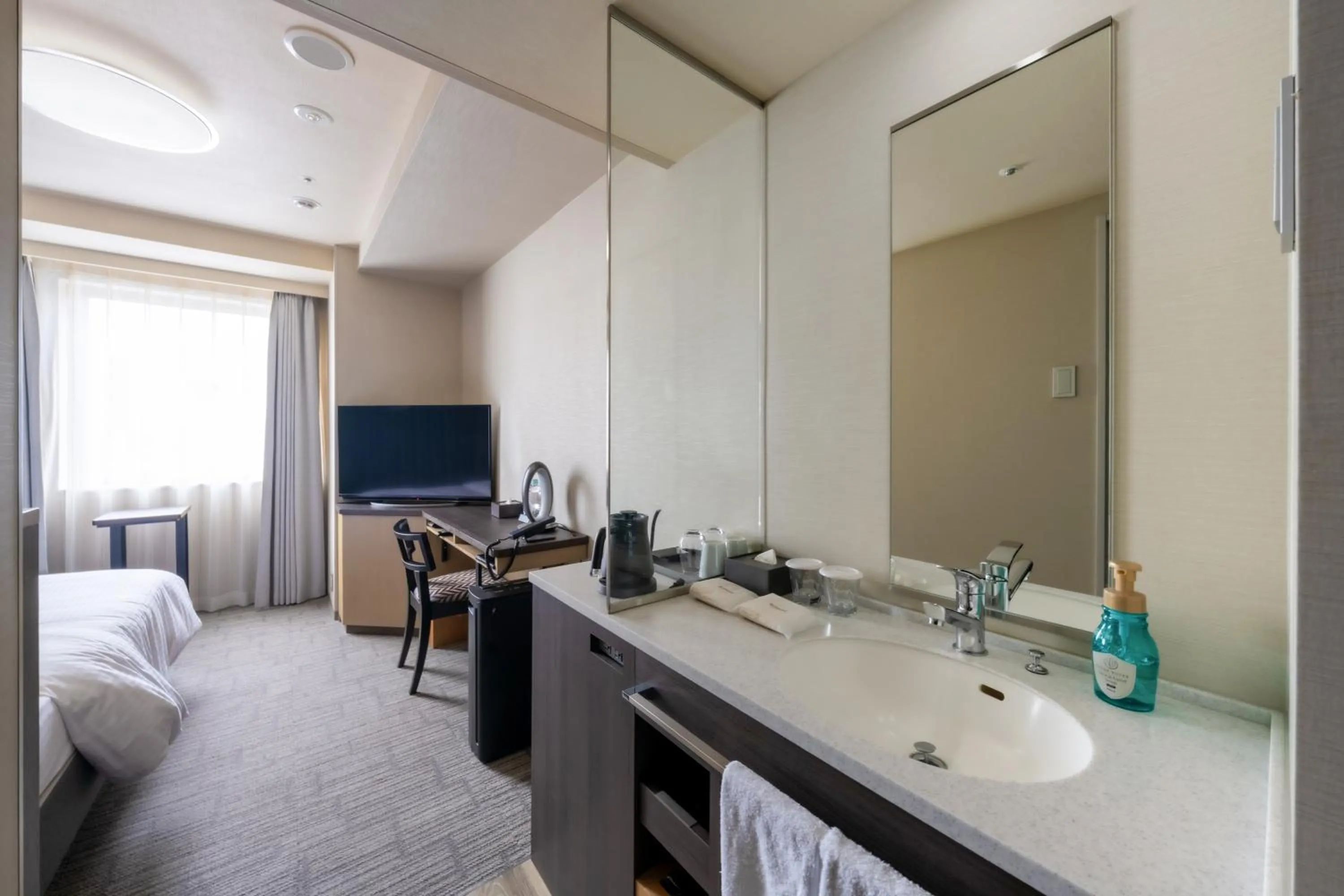 Bed in Richmond Hotel Yokohama Ekimae