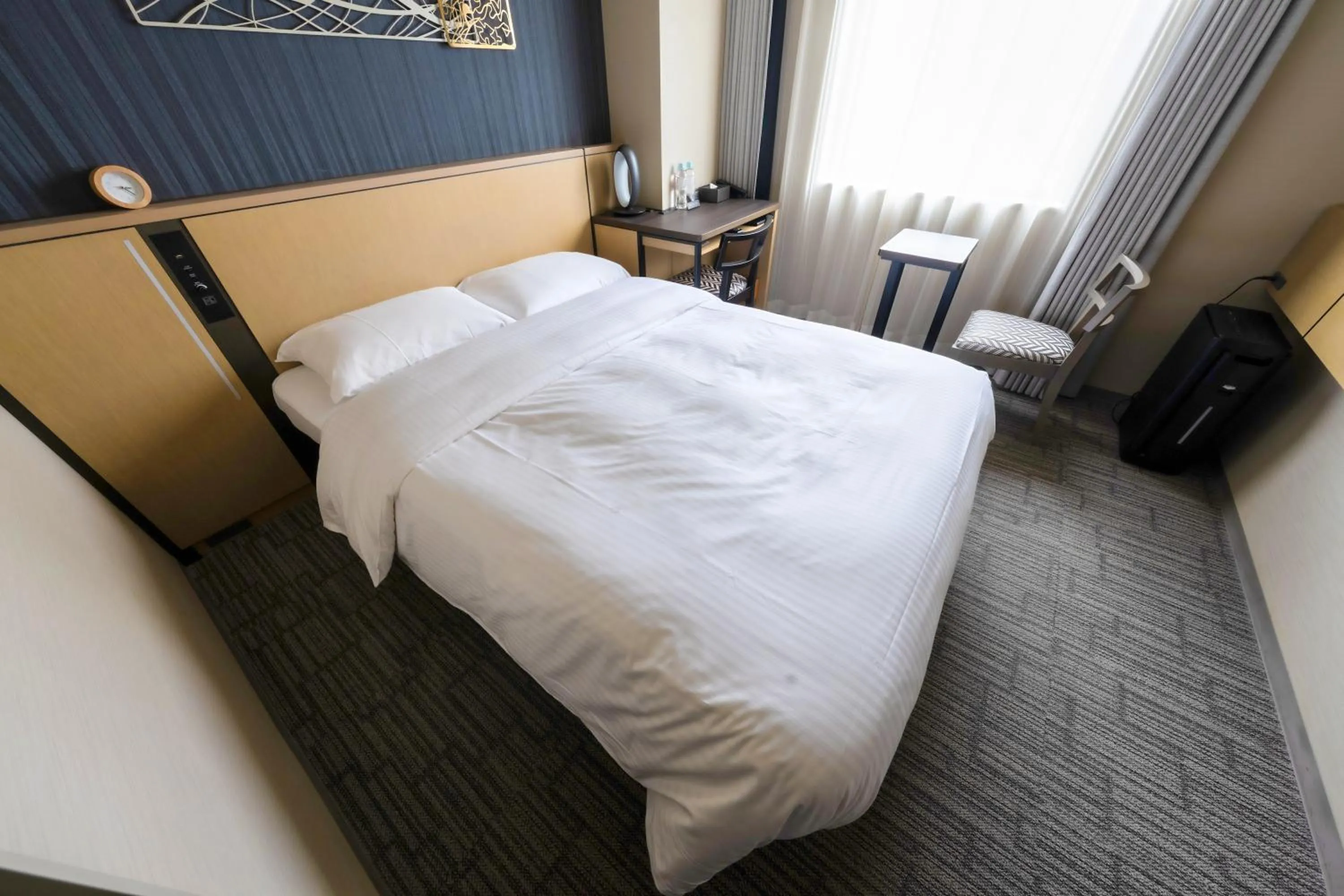 Bed in Richmond Hotel Yokohama Ekimae