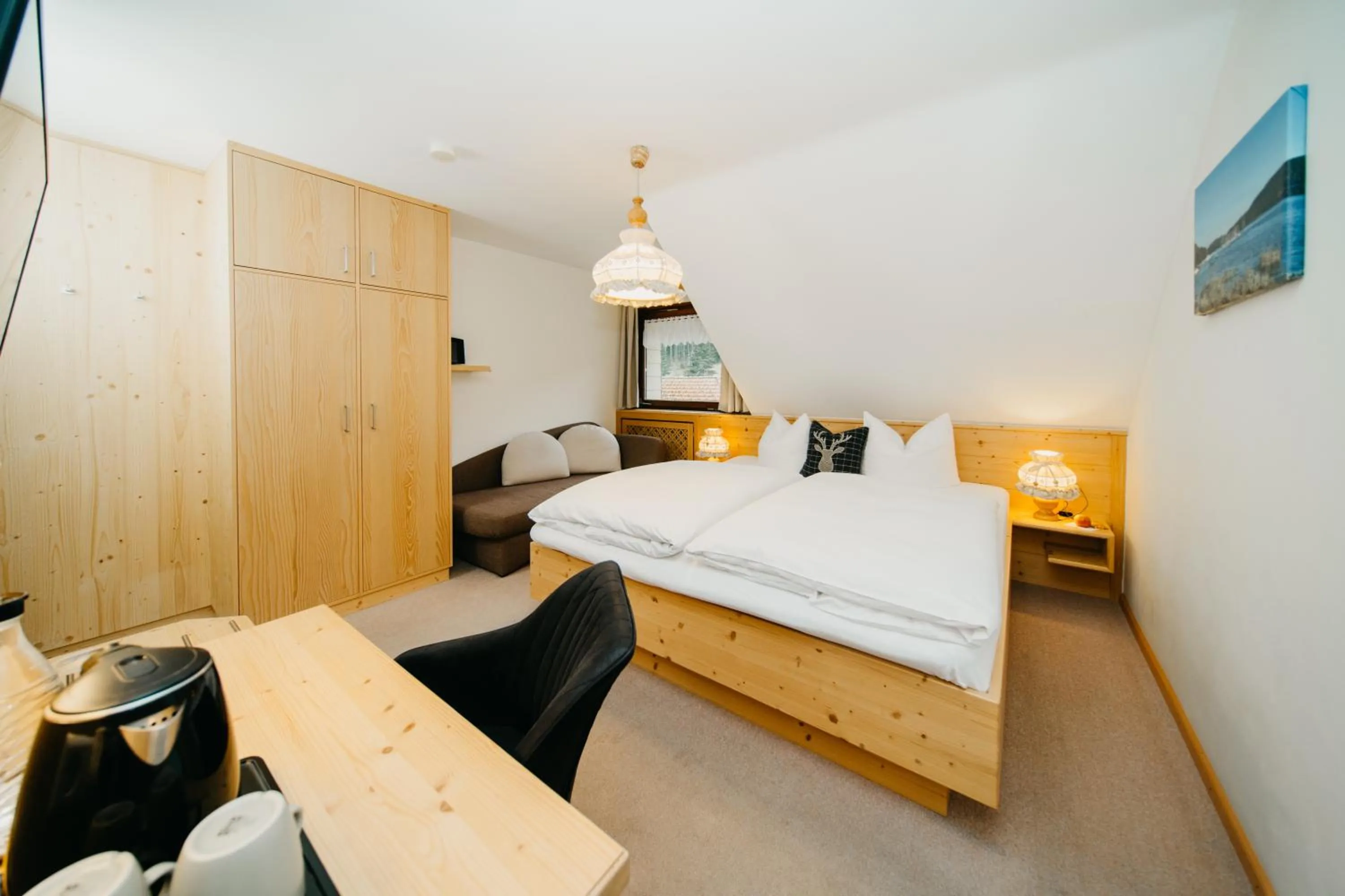 Photo of the whole room, Bed in Schwarzwald-Hotel Kraeutle