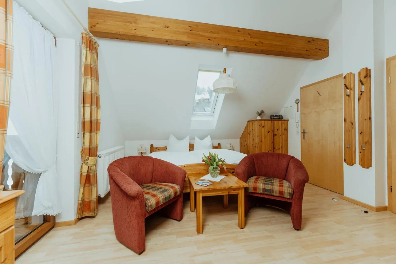 Photo of the whole room, Bed in Schwarzwald-Hotel Kraeutle