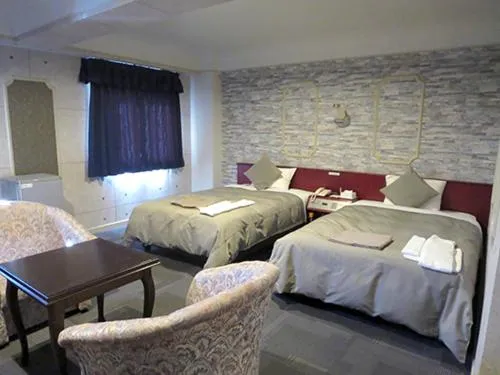 Bed in Hotel Rumieru Hyuga