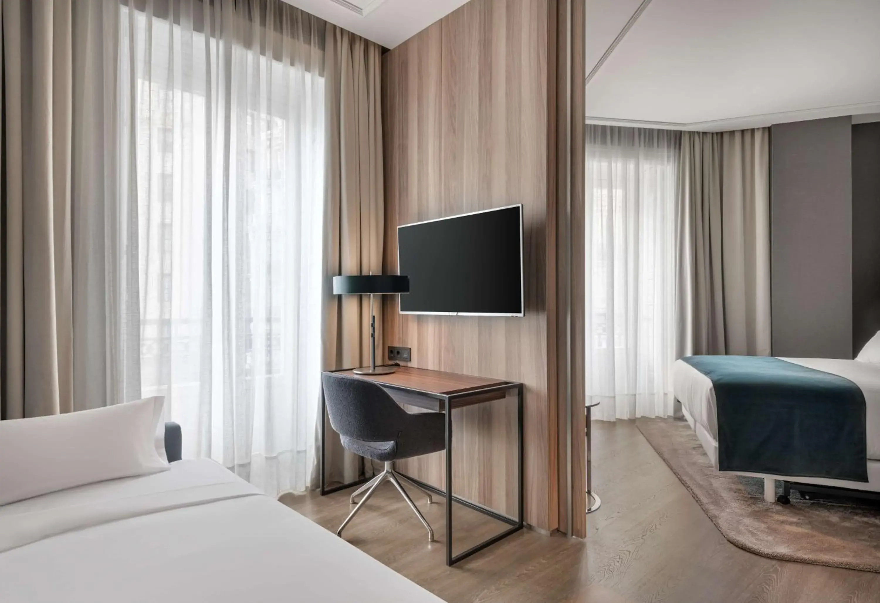 Photo of the whole room, Bed in NH Collection Madrid Gran Vía Photo of the whole room, Bed in NH Collection Madrid Gran Vía