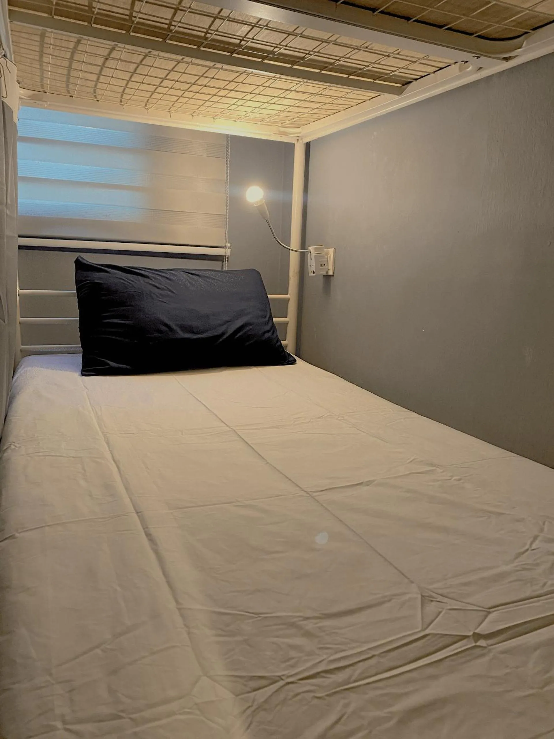 Bed in Travelogue Guest House