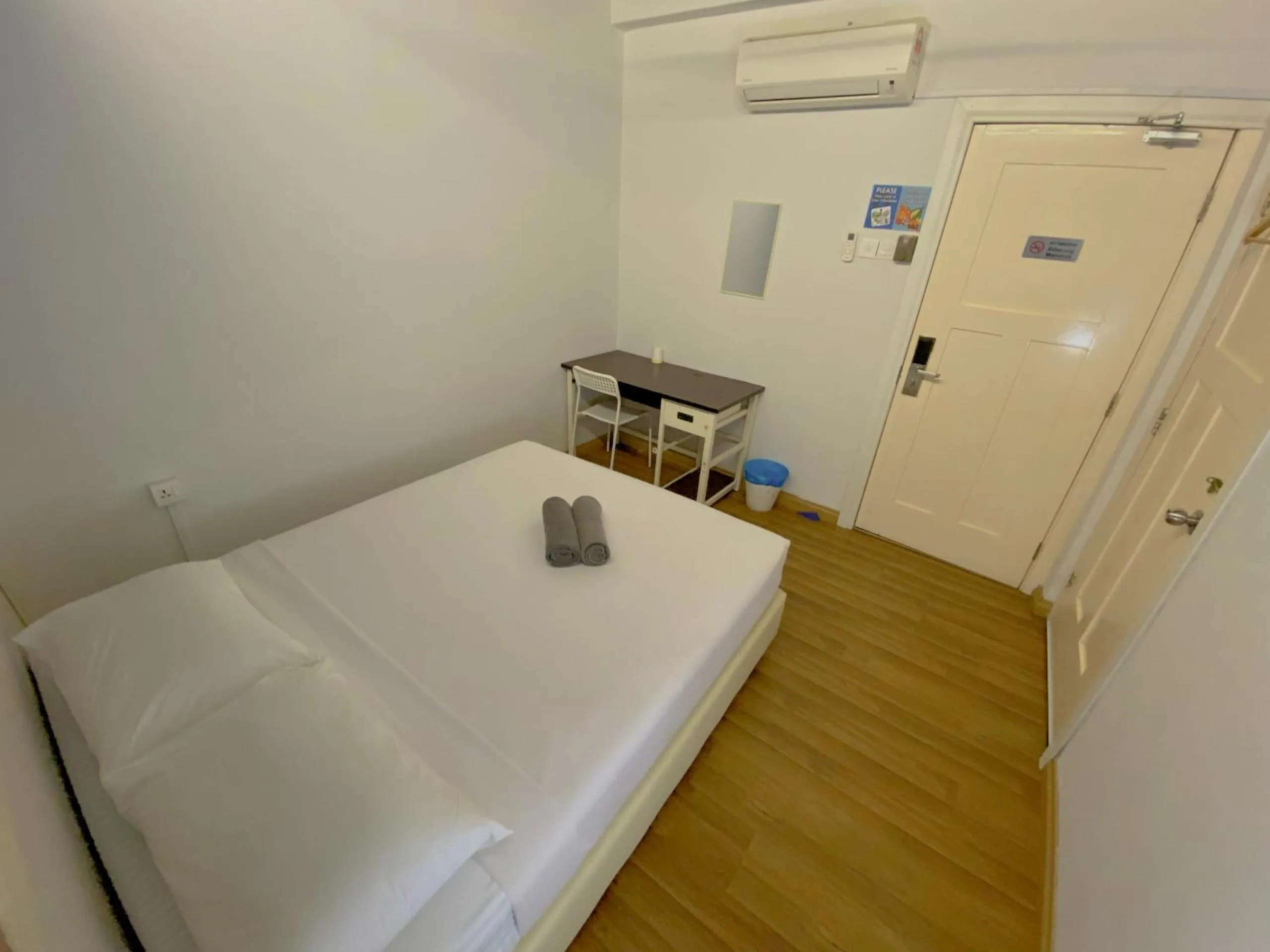 Bed in Travelogue Guest House