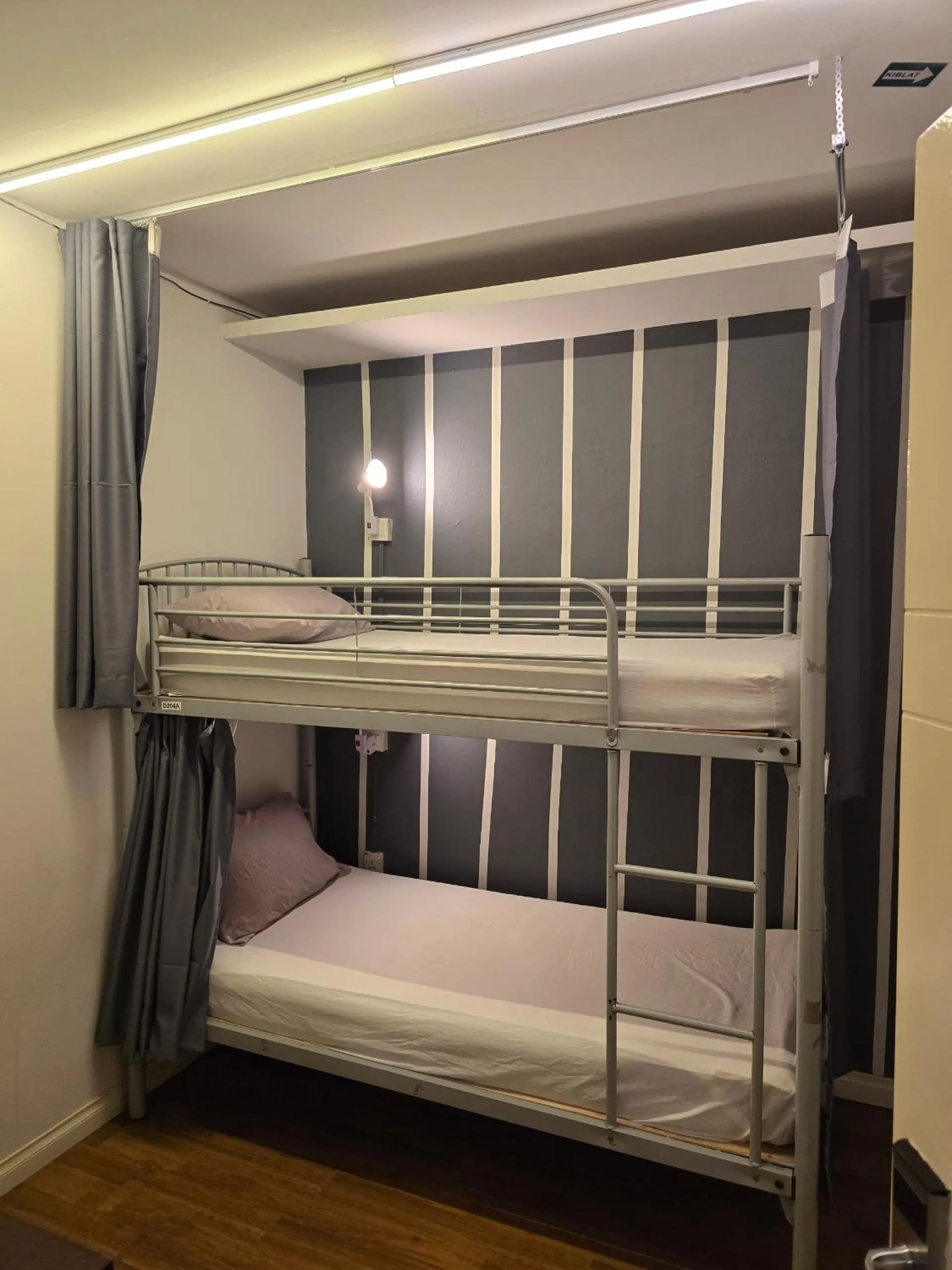 Bed in Travelogue Guest House