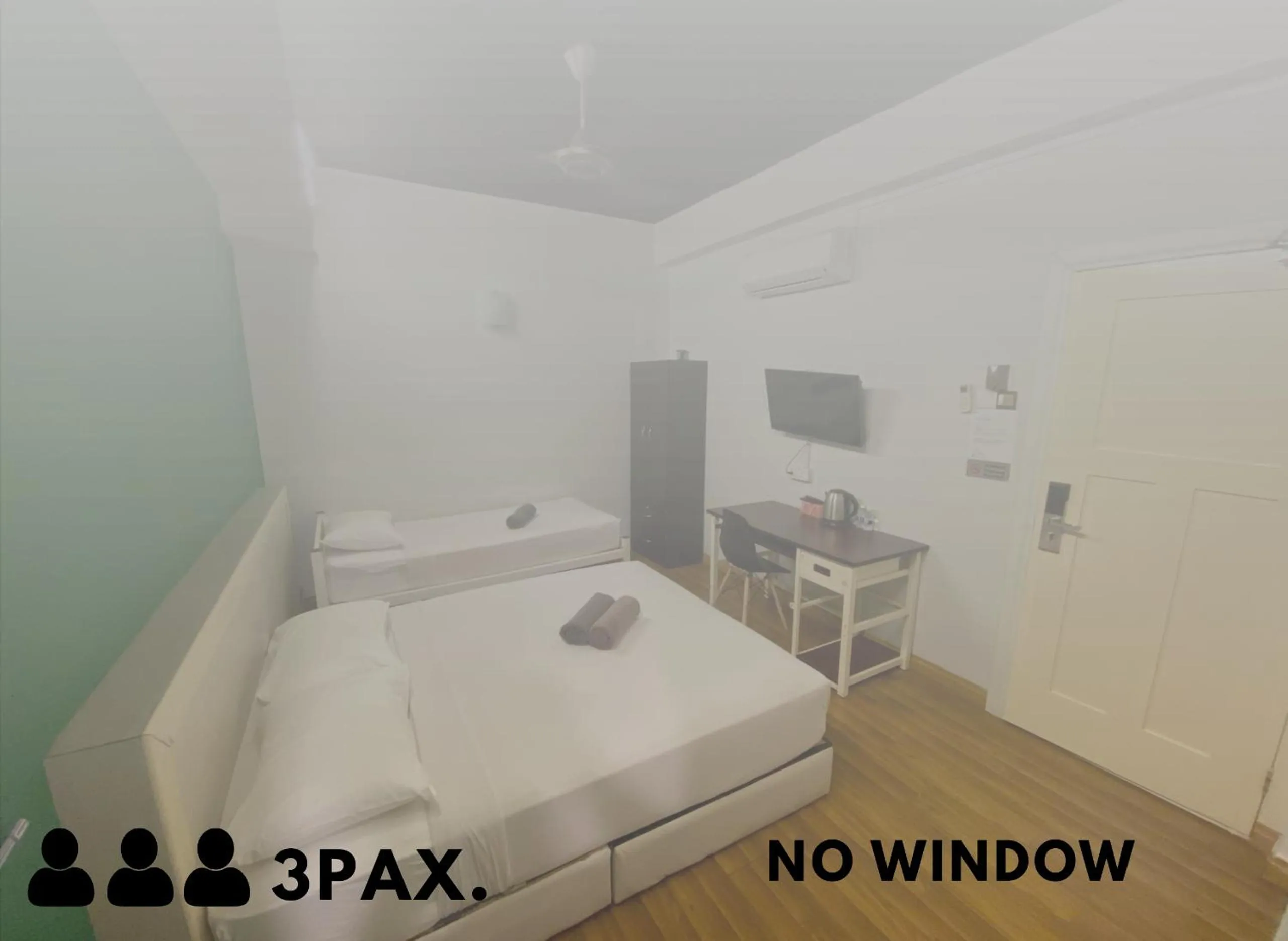 Bed in Travelogue Guest House