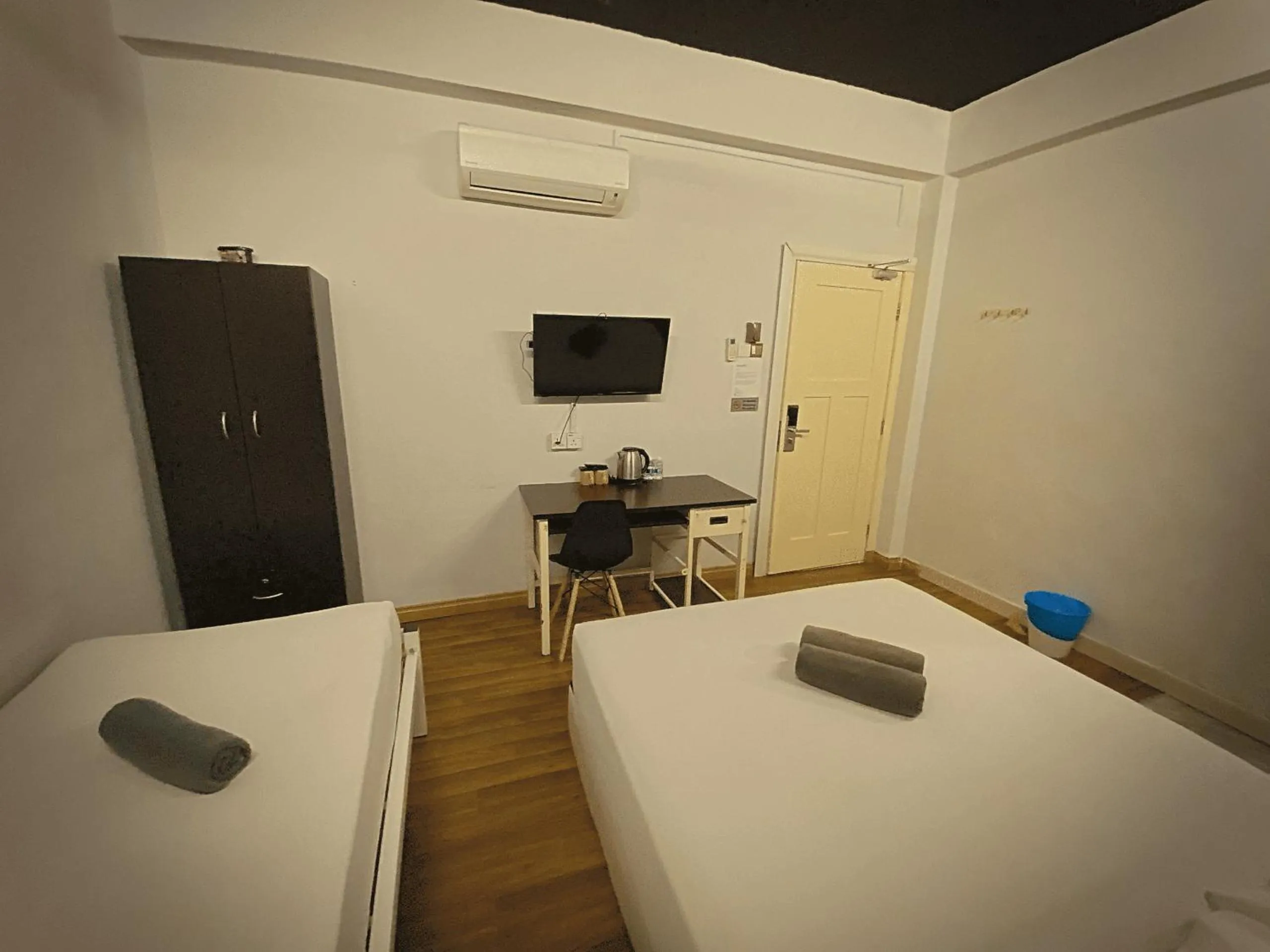 Bed in Travelogue Guest House