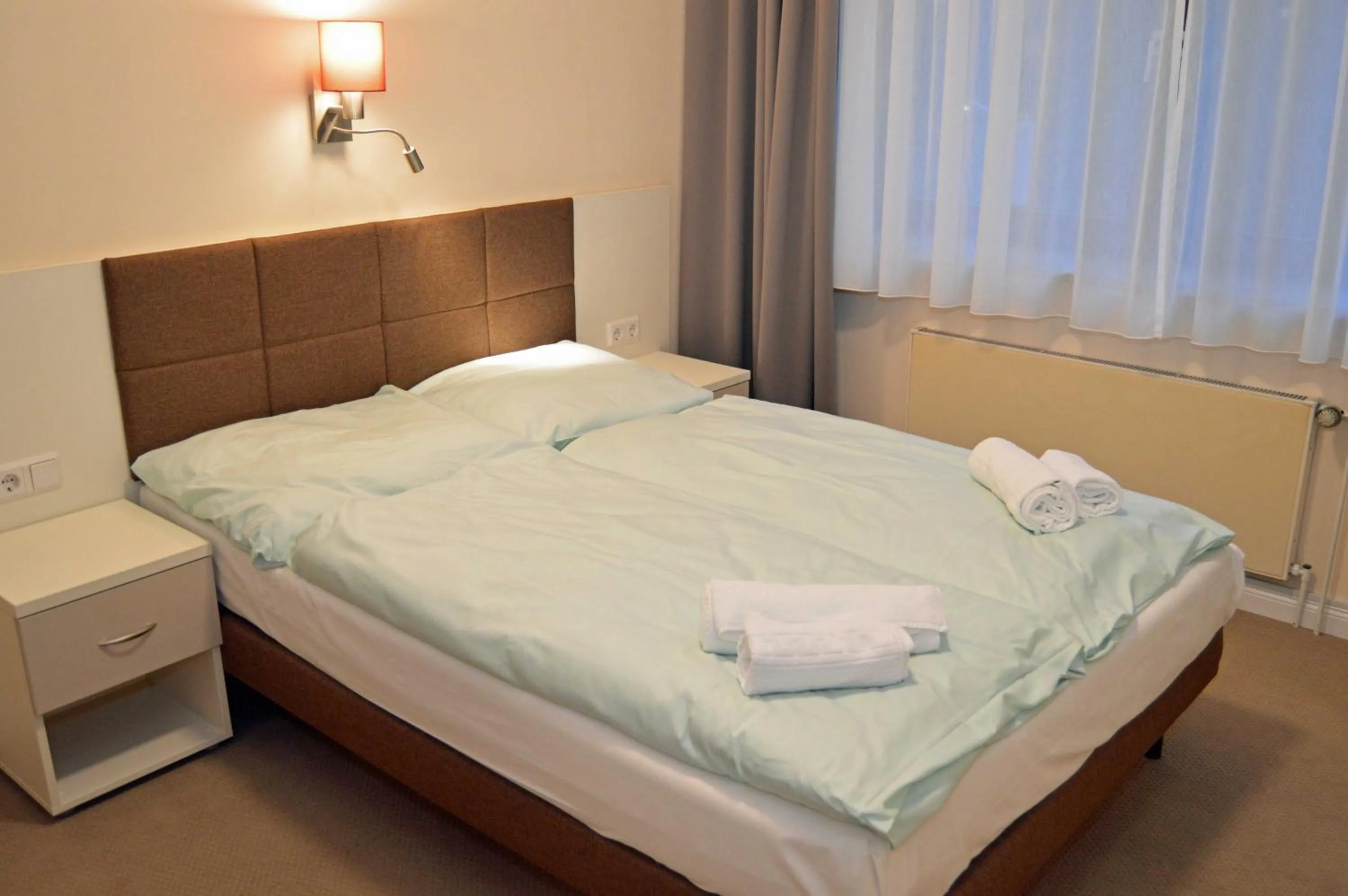 Photo of the whole room, Bed in G&H Hotel Rosengarten