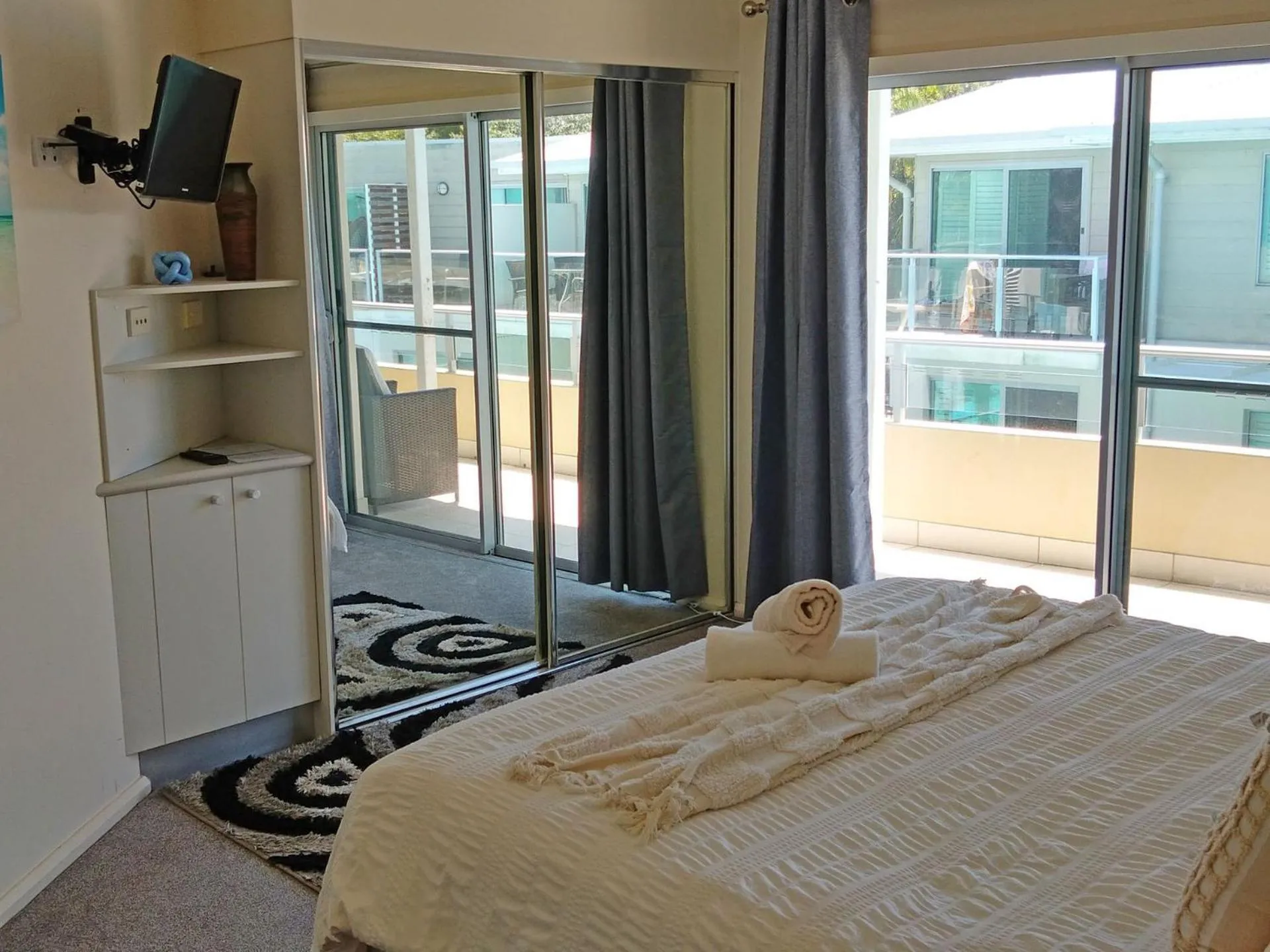 Bed in Pacific Blue Apartment 258, 265 Sandy Point Road