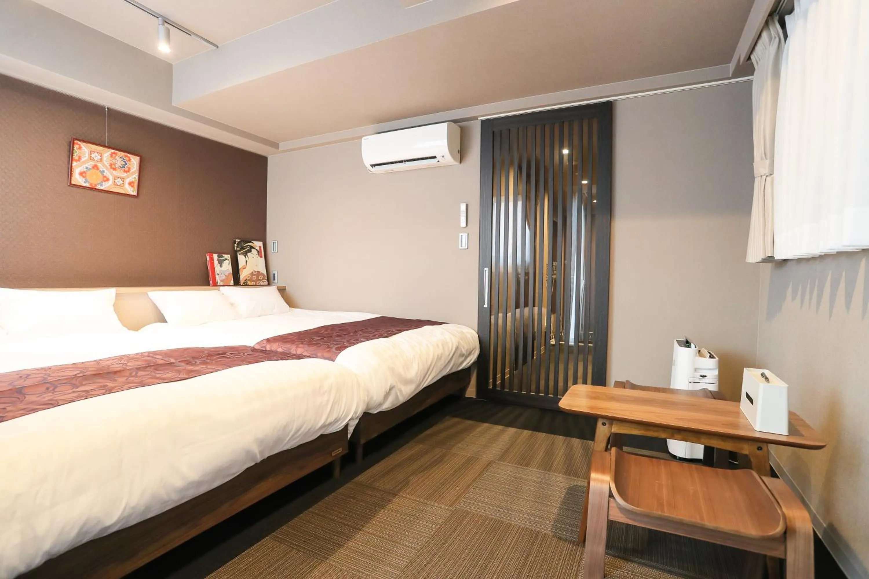 Bed in Apartment Hotel 7key S Kyoto