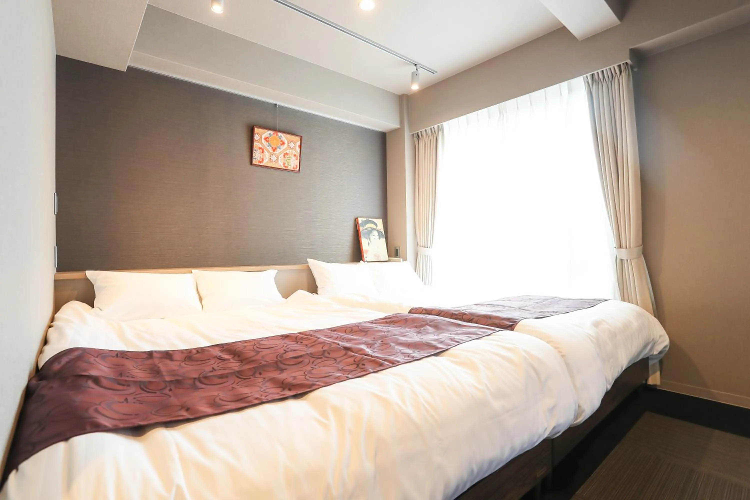 Bed in Apartment Hotel 7key S Kyoto