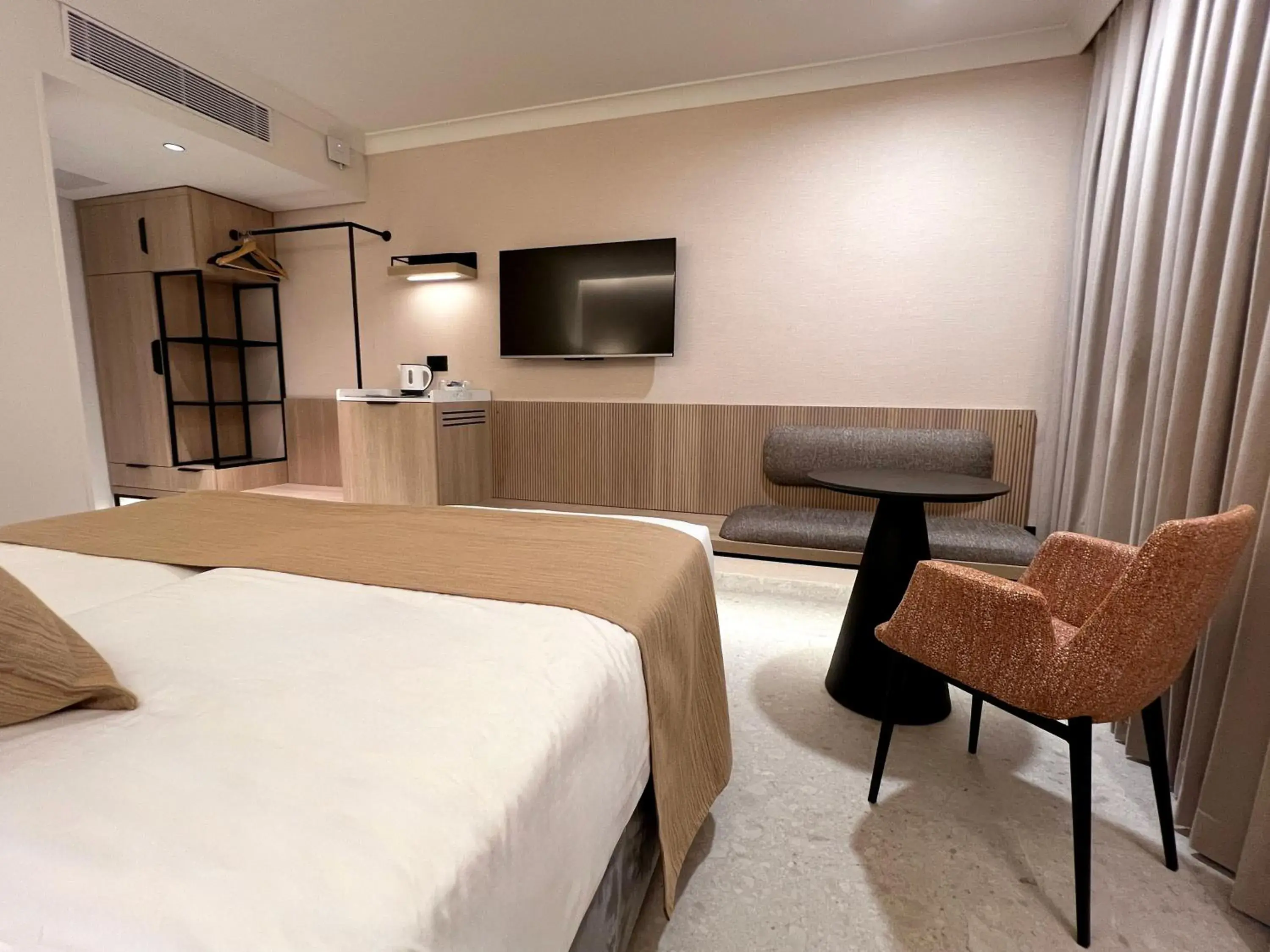 TV and multimedia, Bed in Caesar Premier Jerusalem Hotel TV and multimedia, Bed in Caesar Premier Jerusalem Hotel