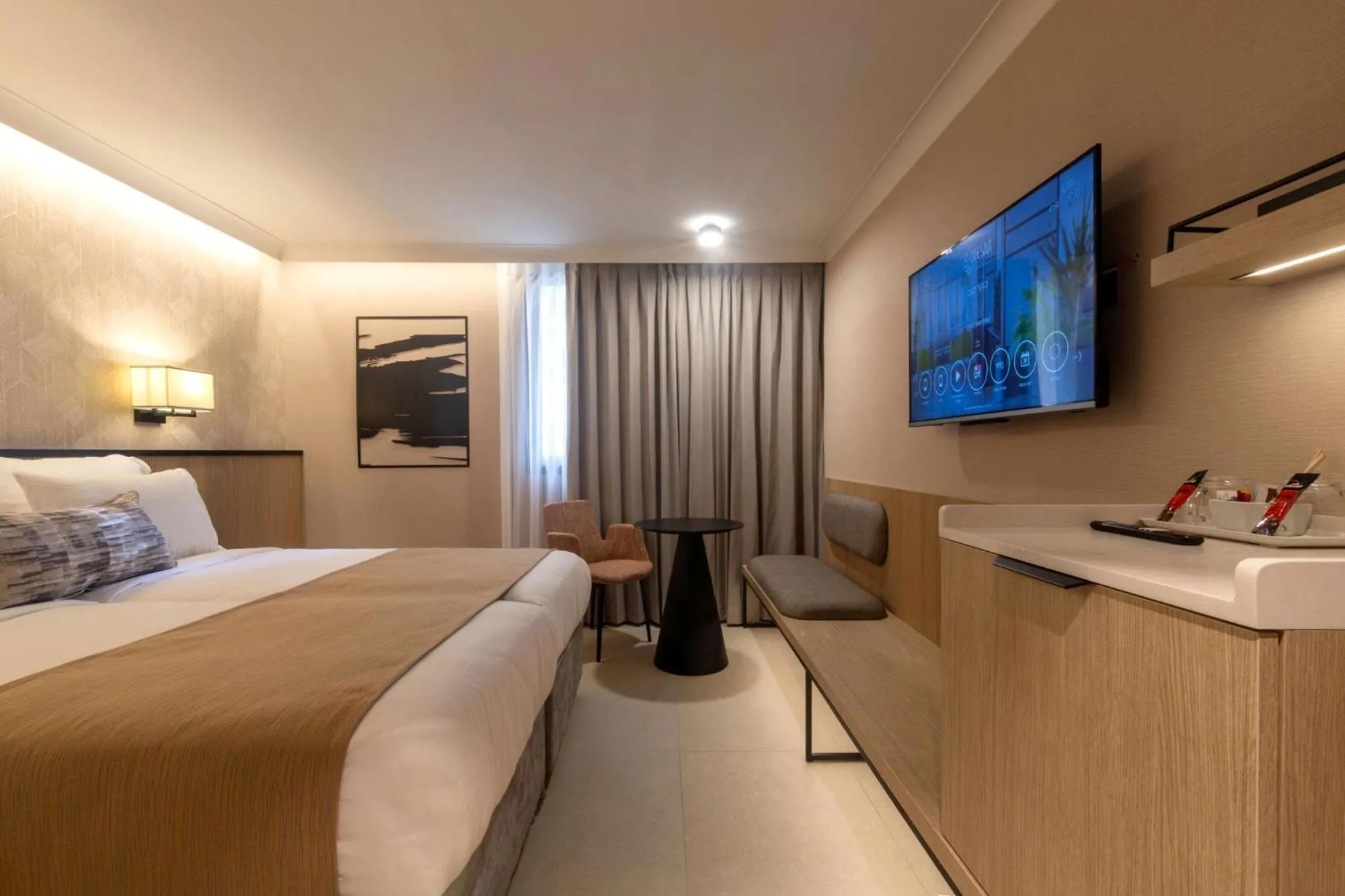 Bed in Caesar Premier Jerusalem Hotel