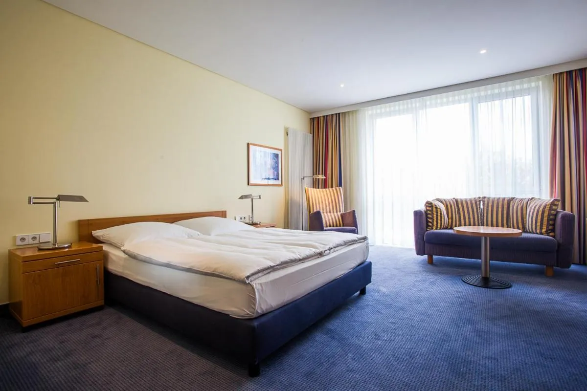 Living room, Bed in Aparion Apartments Berlin