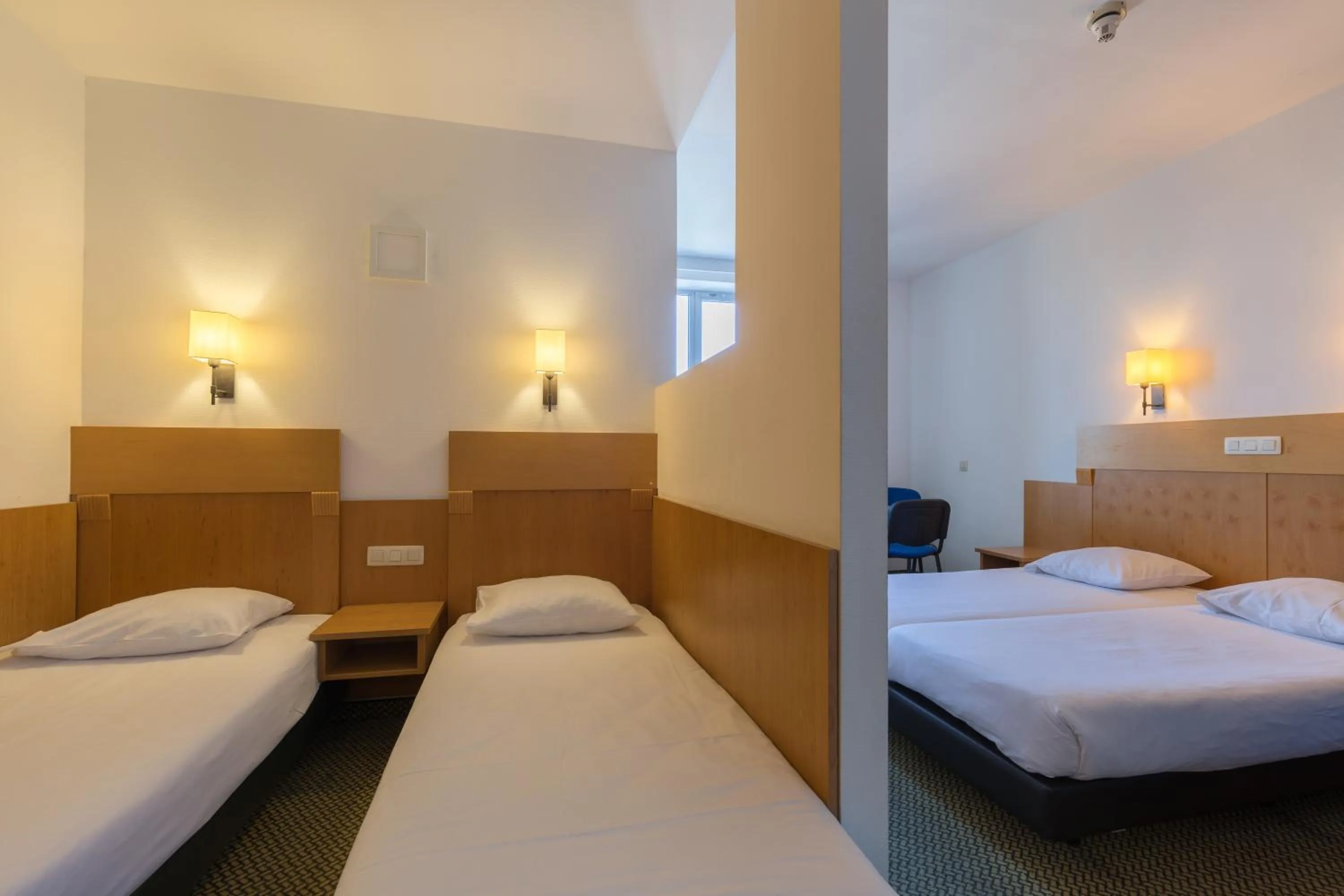 Photo of the whole room, Bed in a&o Antwerpen Centraal